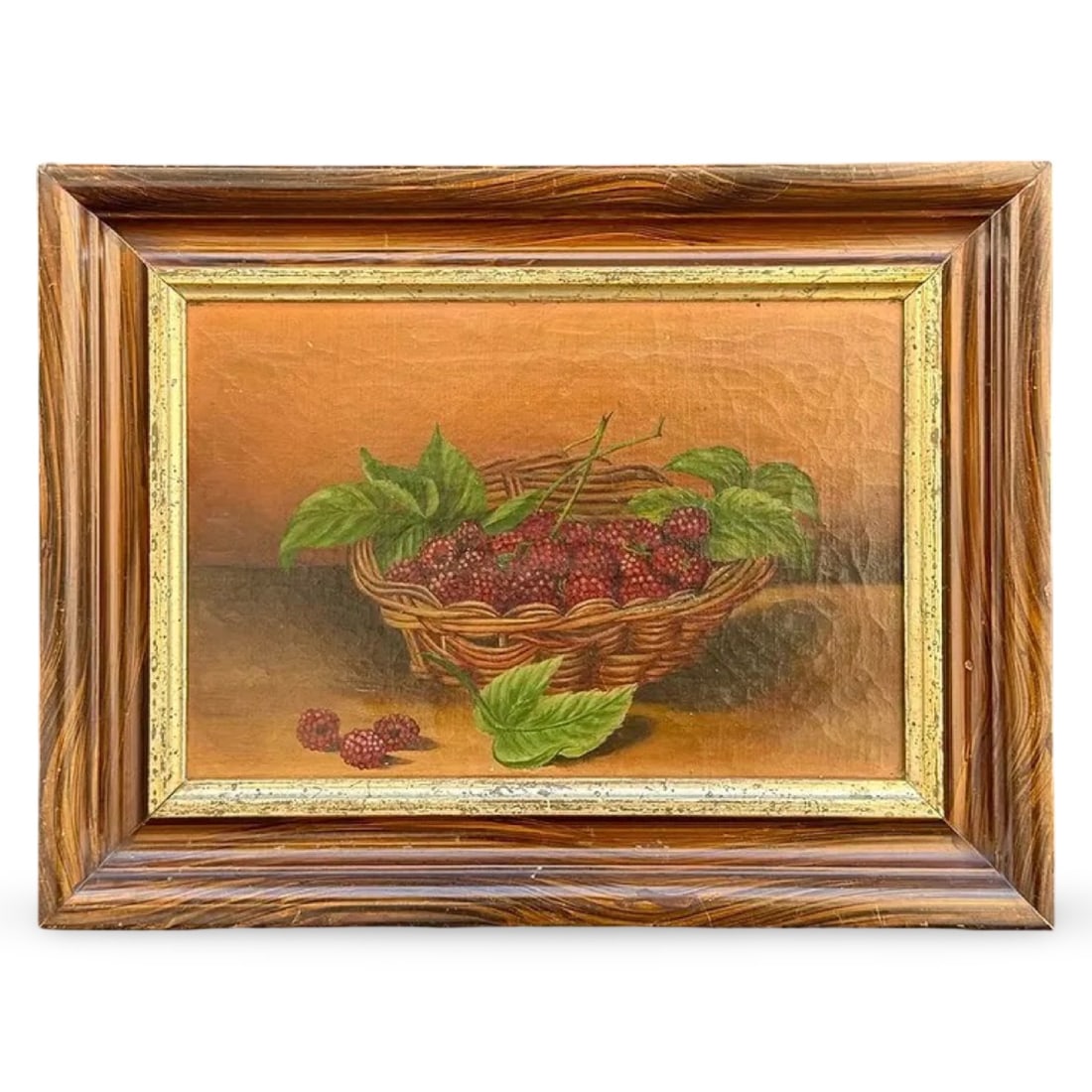 Antique Raspberry Fruit Still Life Oil Painting: Antique Raspberry Fruit Still Life Oil Painting An antique still-life oil painting attributed to the American School, depicting a woven basket overflowing with ripe red raspberries. Dimensions: 15.75W
