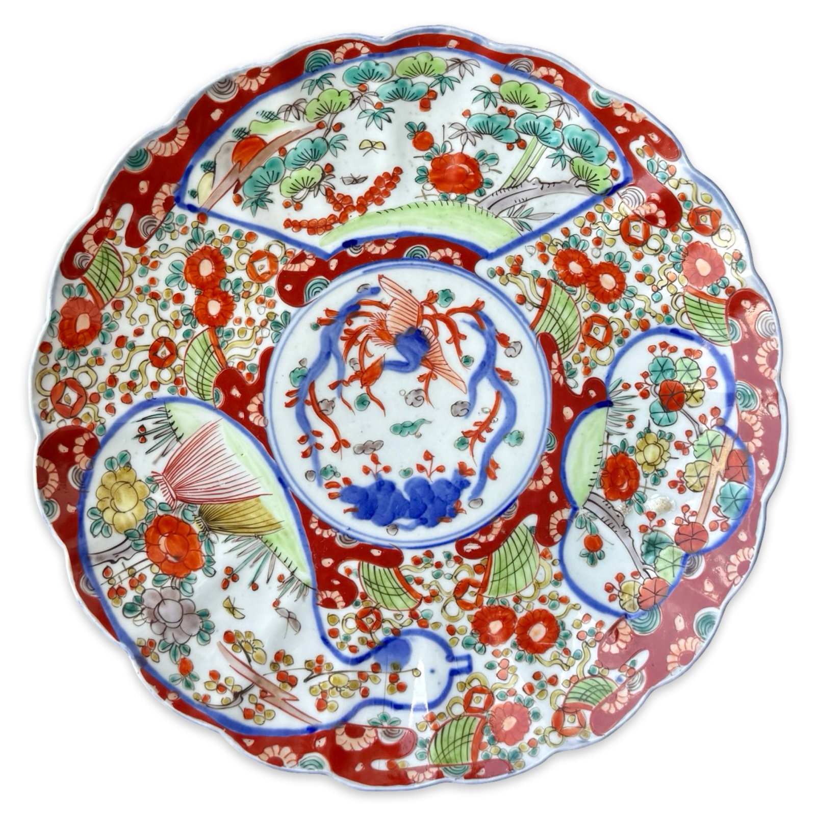 Japanese Meiji Imari Charger Plate: Japanese Imari porcelain charger plate with phoenix and traditional Fukagawa-style panel design. Approx. Dimensions: 1.5H x 12.5W x 12.5D inches