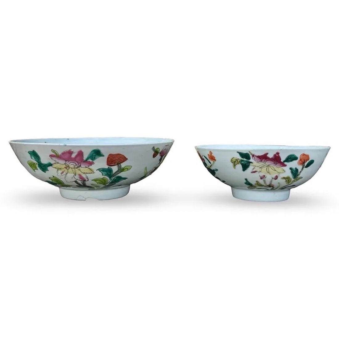Chinese Famille Rose Bowls, Pair: Pair of Chinese Famille Rose porcelain bowls with floral decoration. Possible attribution to late Qing to early Republic period. Each is marked on base. Approx. Dimensions: Larger bowl: 2.75H x 8W x 8