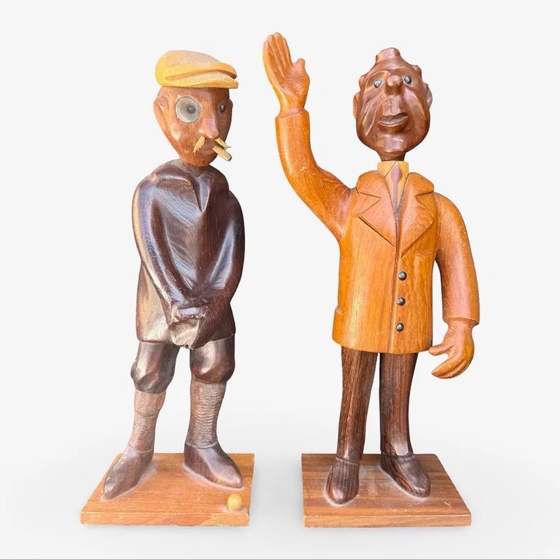 Italian Romer Wood Caricature Figures: Pair of vintage mid-century hand-carved wood caricatures by Romer-Cormano, Italy, of a golfer and a Richard Nixon figure. Approx. Dimensions: 12H