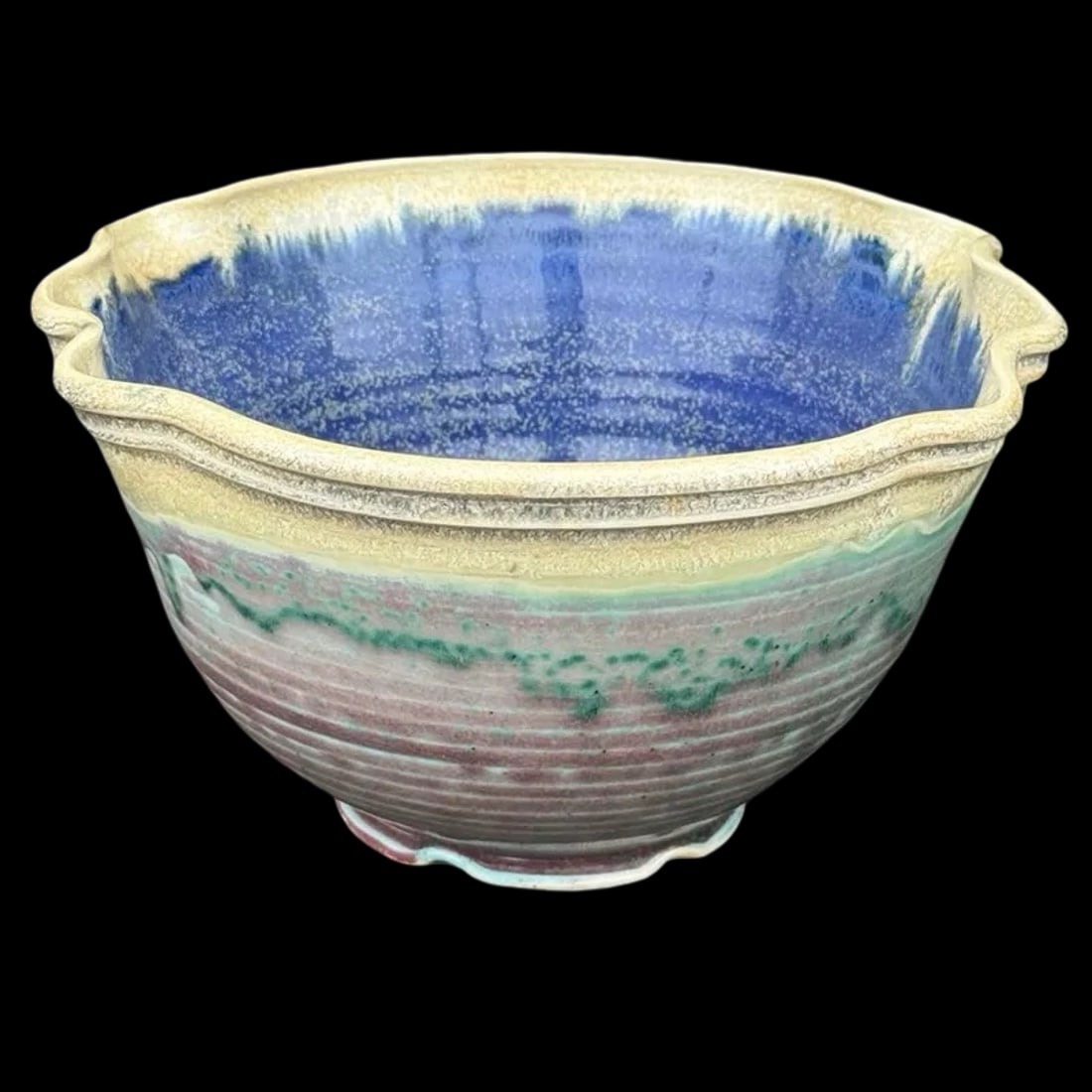 Studio Pottery Scalloped Bowl: Hand-thrown studio pottery bowl with scalloped rim and layered glazes. Signed on base. Approx. Dimensions: 4H x 7W x 7D inches