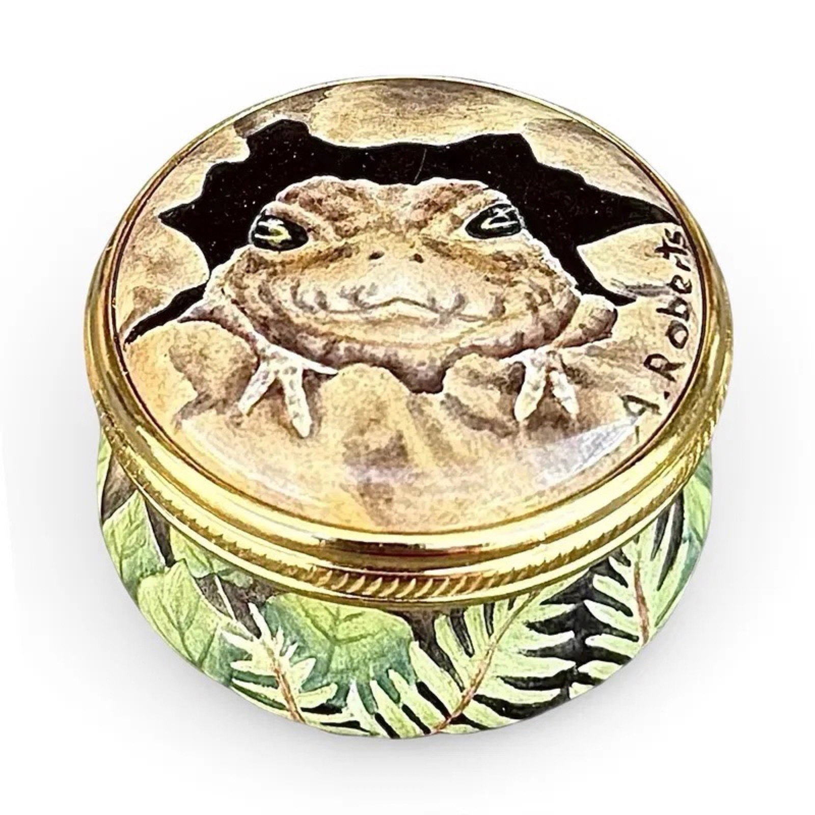 Elliot Hall Toad Wildlife Enamel Box: Elliot Hall Enamels limited-edition wildlife trinket box with a toad, hand-painted by Angela Roberts. Signed and marked on base, with toad motif on interior of lid. Approx. Dimensions: 1H x 1.25W x