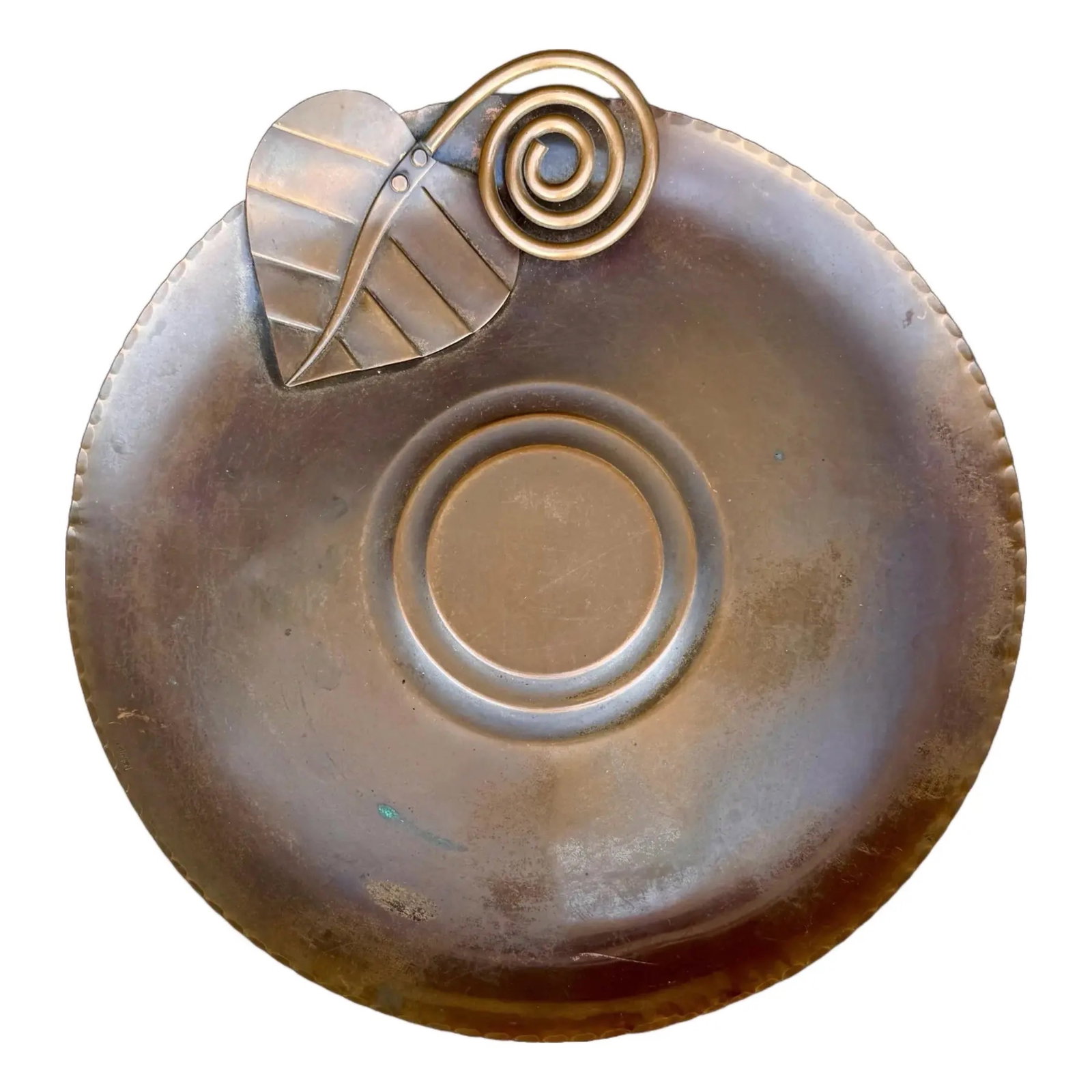 Francisco Rebajes Copper Charger: Vintage Francisco Rebajes hammered copper charger with a stylized leaf. Includes integrated hanger for display.