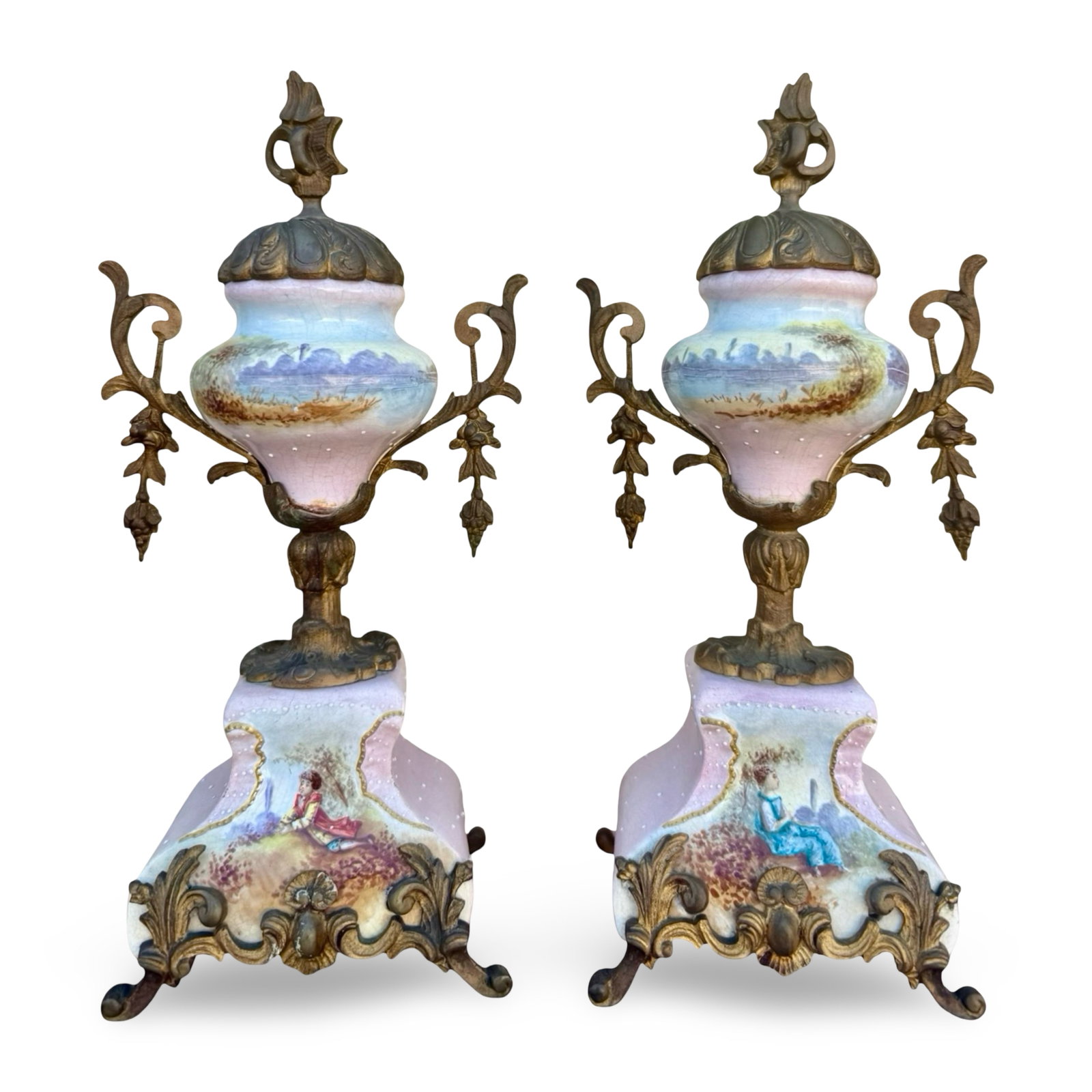 19thC French Covered Urns Cassolettes Pair: Pair of antique French Sevres-style pink porcelain cassolettes / urns with hand-painted landscapes and figures and Rococo-revival gilt bronze mounts.