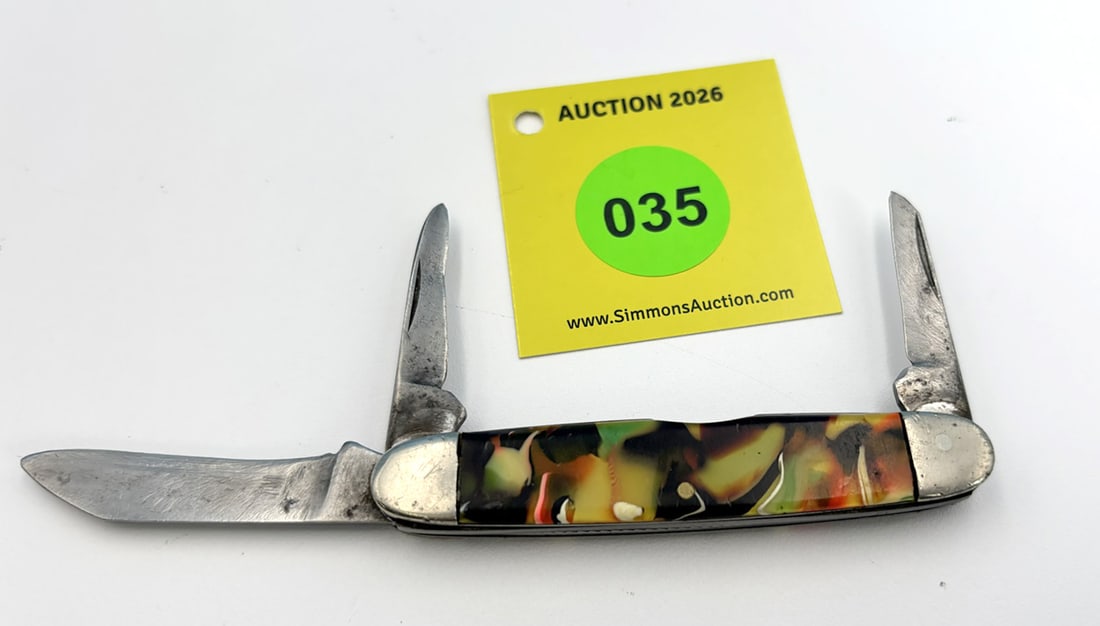 Kent N. Y. - Celluloid Stockman, heavily used, lazy blades (1 of 3)