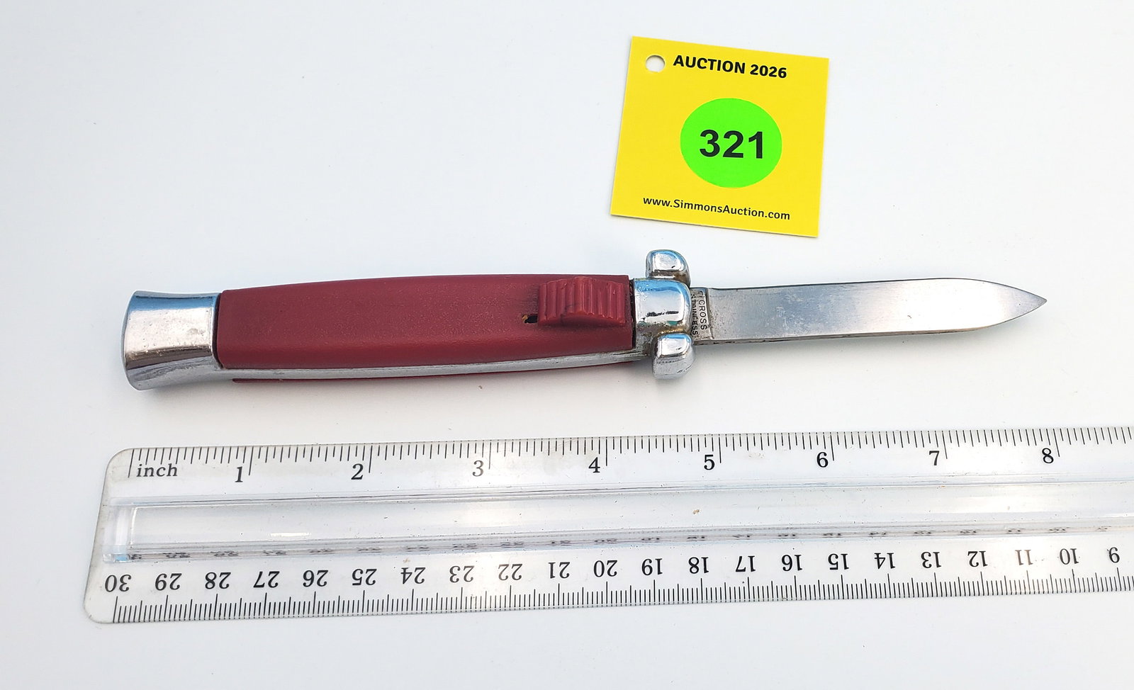 Switchblade out the front, red handle: Switchblade out the front, red handle 