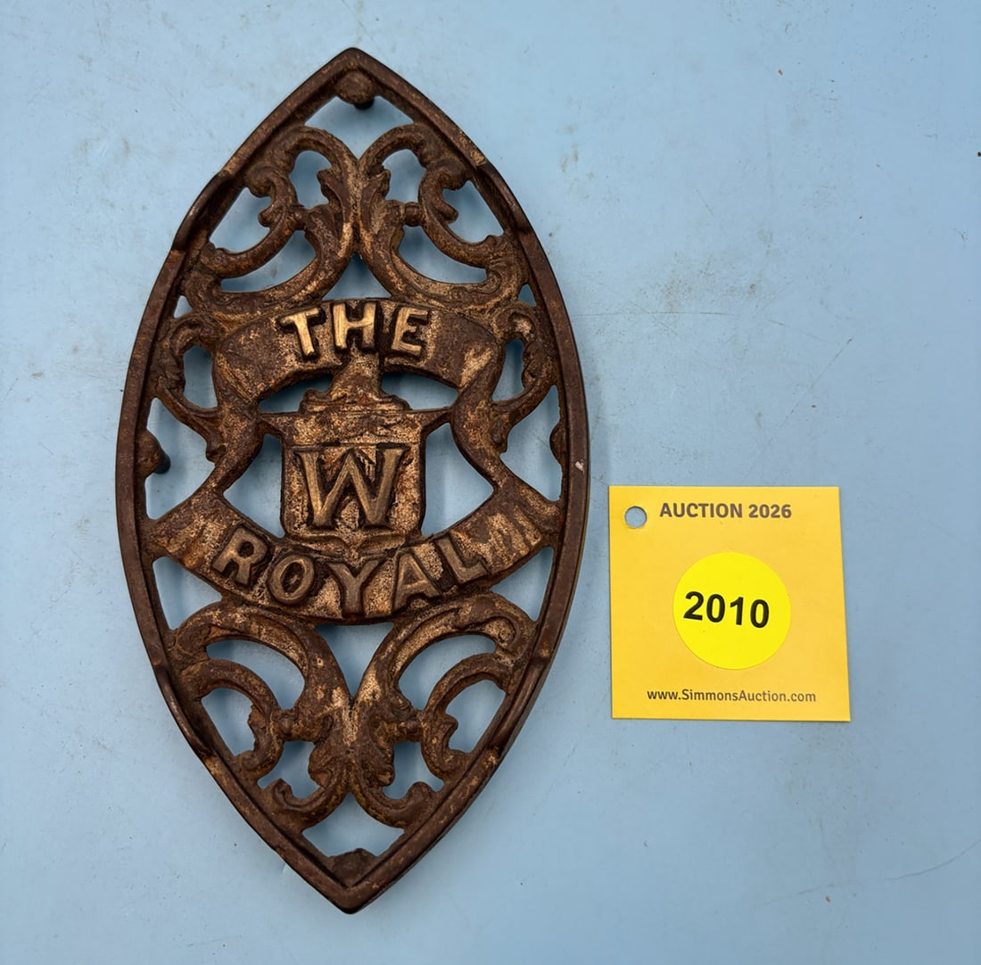 W The Royal 7 1/2'' x 4'' w/ four feet trivet. Small running fox above the W, with two iron guide... (1 of 2)