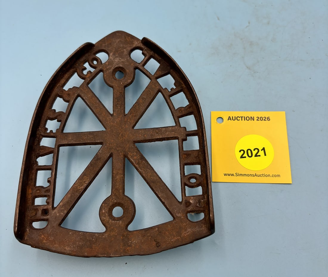 Ives "Spider Web" 6'' x 4 1/2'' w/ three feet trivet . On face " H.R. Ives & Co. Montreal". With...: Ives "Spider Web" 6'' x 4 1/2'' w/ three feet trivet . On face " H.R. Ives & Co. Montreal". With two iron guide rails.