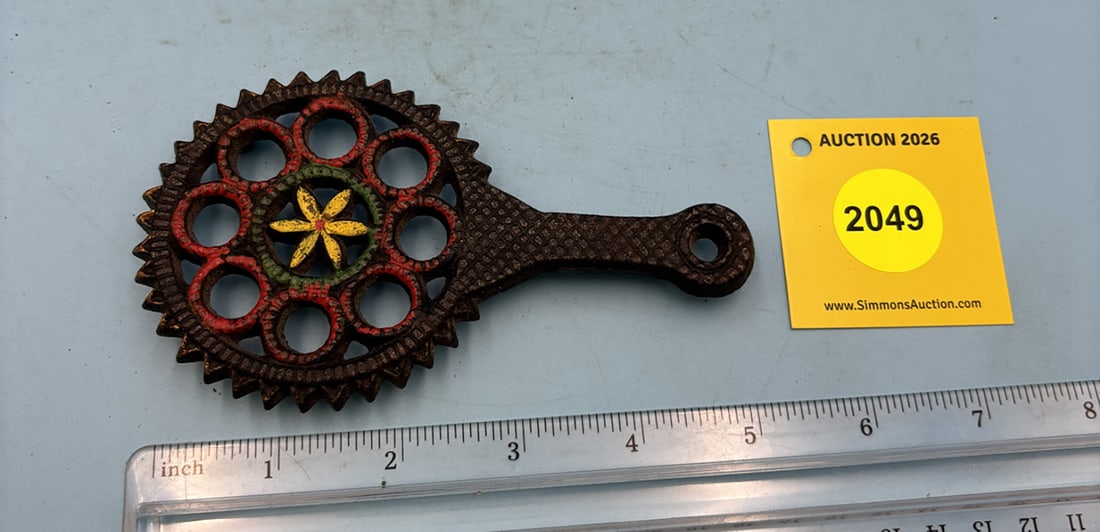 Unmarked Mini Hex. 5 1/4'' x 3'' w/ three feet trivet. Face is painted with gold, red, green, and... (1 of 2)