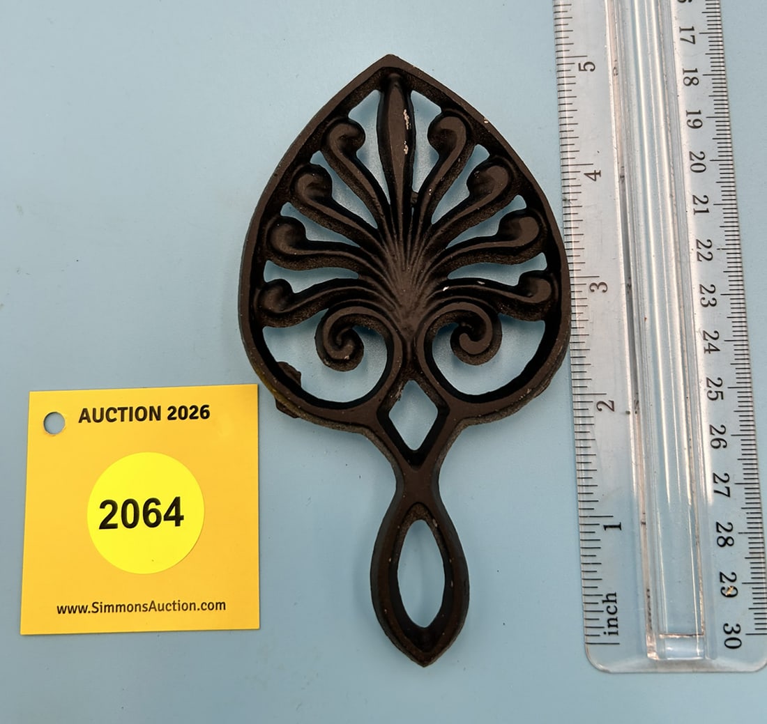 Unmarked Mini Peacock 5'' x 3'' w/ three feet trivet. (1 of 2)