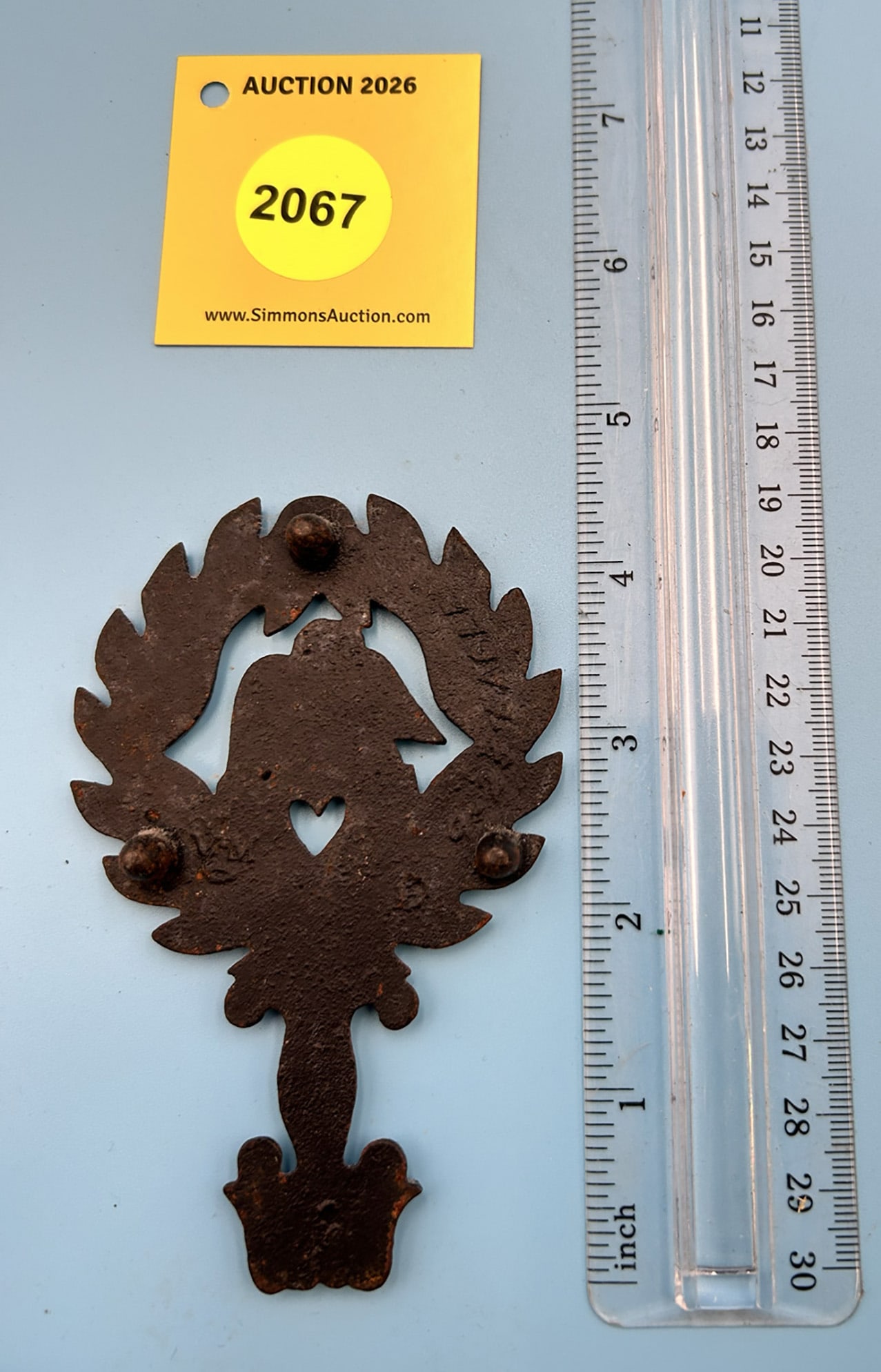 Unsigned Mini Eagle 4 1/2'' x 2 1/2'' w/ three feet trivet. On reverse marked with 9-23 Eagle - 2