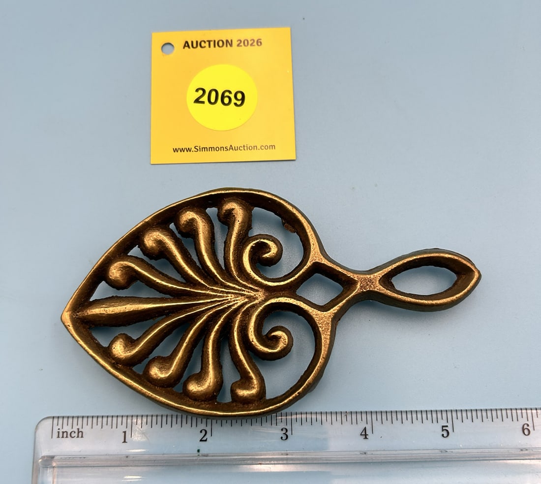 Brass Wilton Mini Peacock 5'' x 3'' w/ three feet trivet. On reverse marked with Wilton (1 of 2)