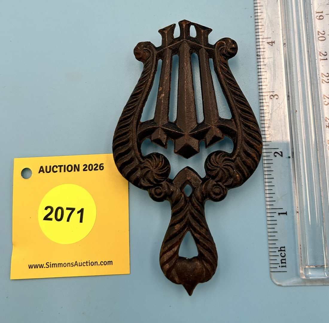 H. Burns Lyre 4 1/2'' x 2 1/2'' w/ three feet trivet. On reverse marked with "H. Burns Lyre 7- 25... (1 of 2)