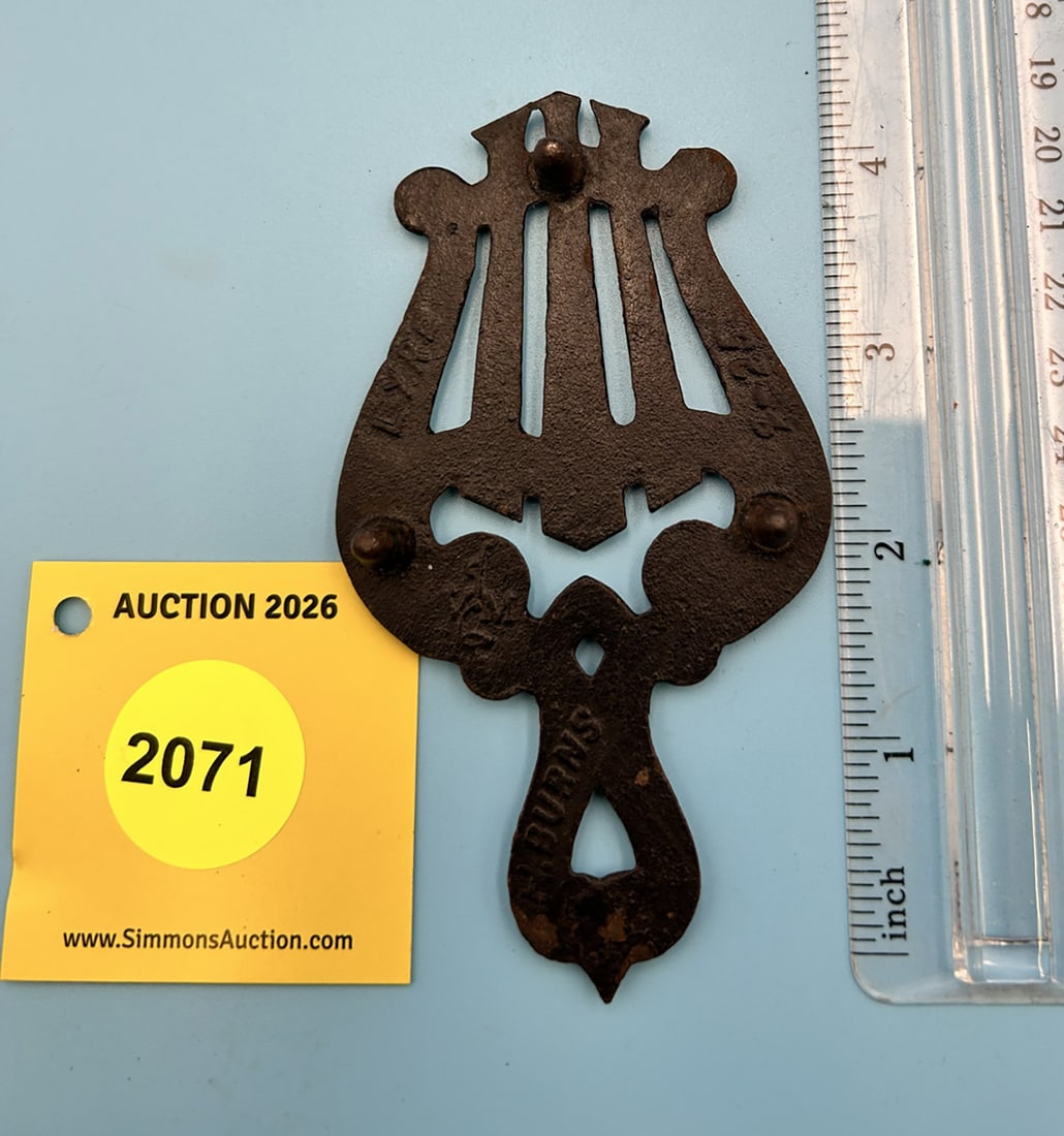 H. Burns Lyre 4 1/2'' x 2 1/2'' w/ three feet trivet. On reverse marked with "H. Burns Lyre 7- 25... - 2