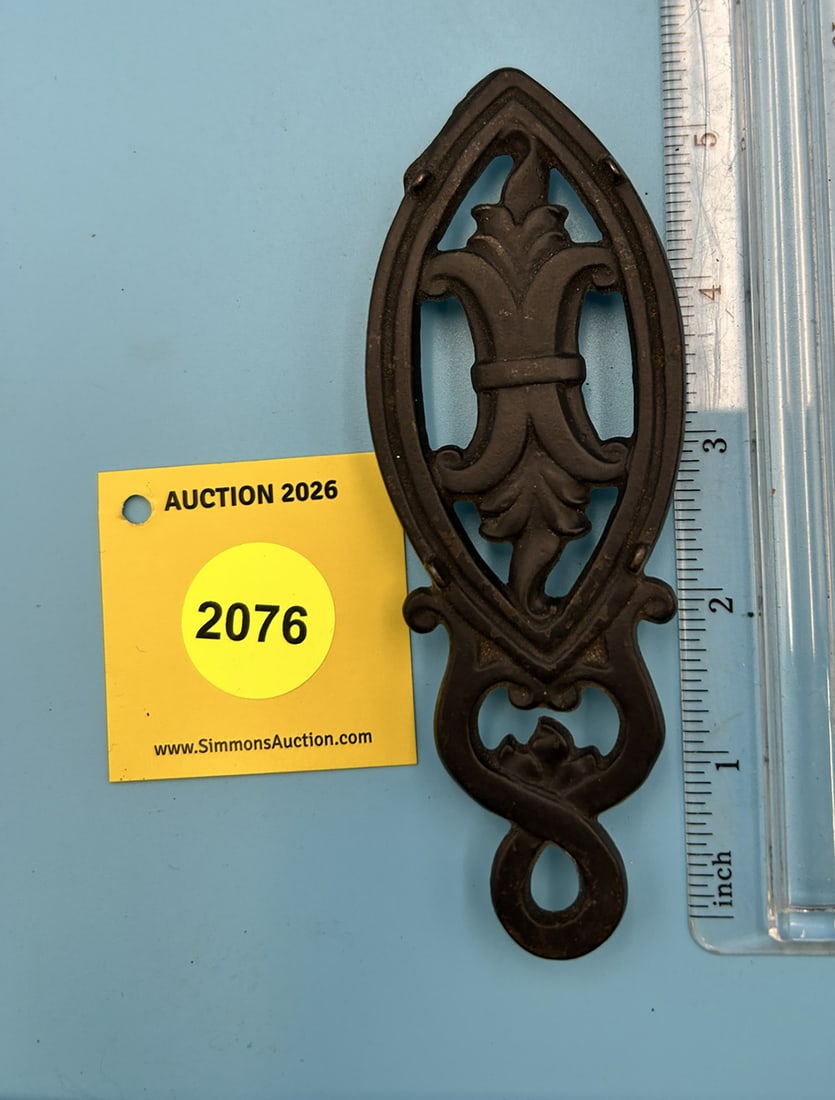 Handled X 5 1/2'' x 2'' w/ three feet trivet. With four little iron guides on top (1 of 2)