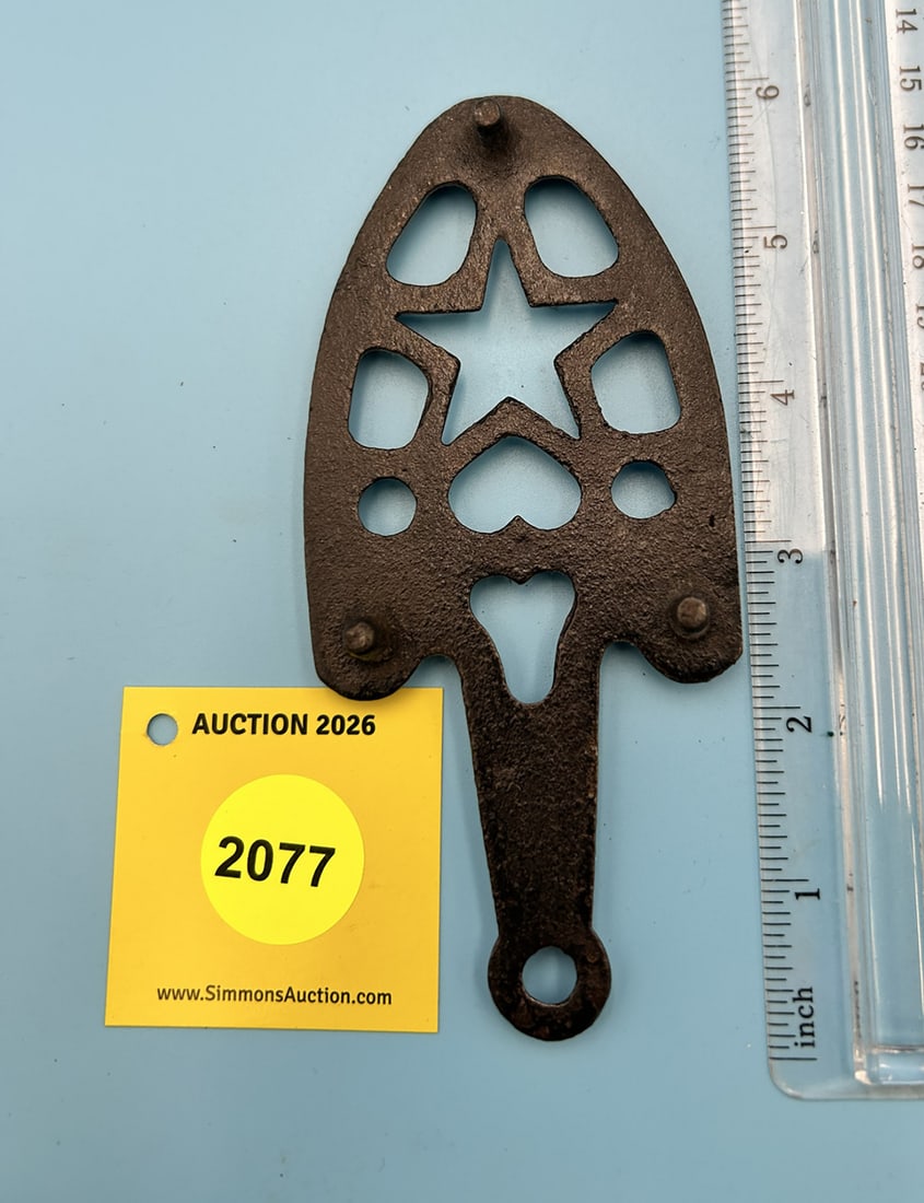 Unsigned Star with Holes 5 1/2'' x 2 1/2'' w/ three feet trivet. With two iron guide rails - 2