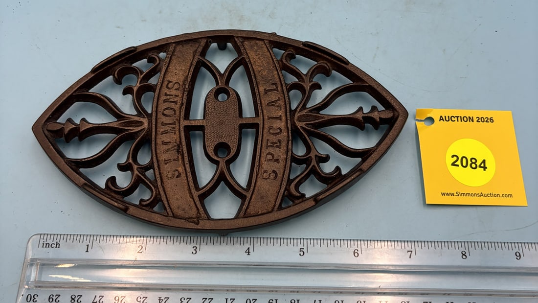 Simmons w/ Inscribed letters 7 3/8'' x 4 3/8'' w/ four feet trivet . Engraved on face Simmons Spe... (1 of 2)
