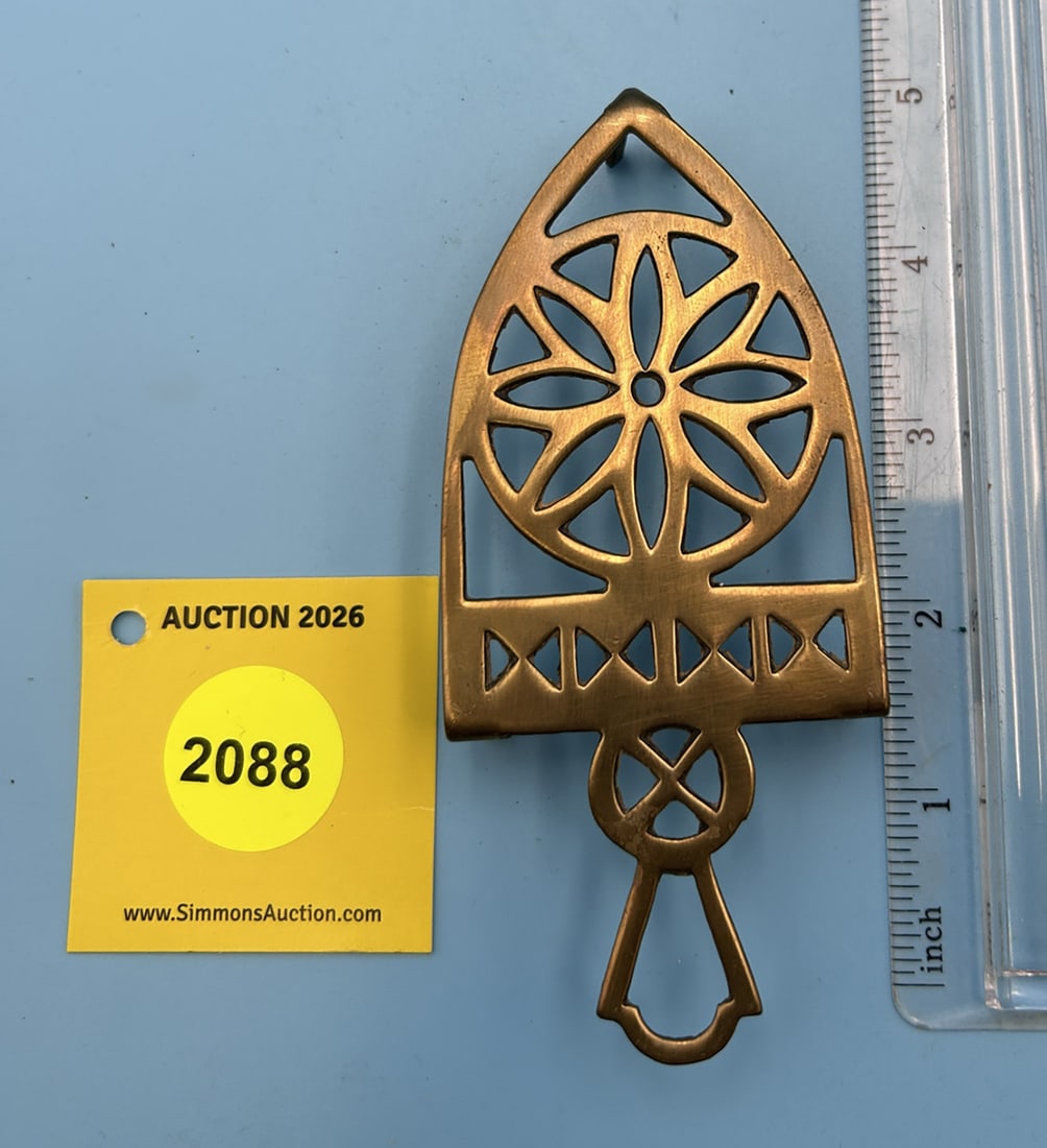 English Flower hand cut brass 5'' x 2 3/4'' w/ three feet trivet. (1 of 2)