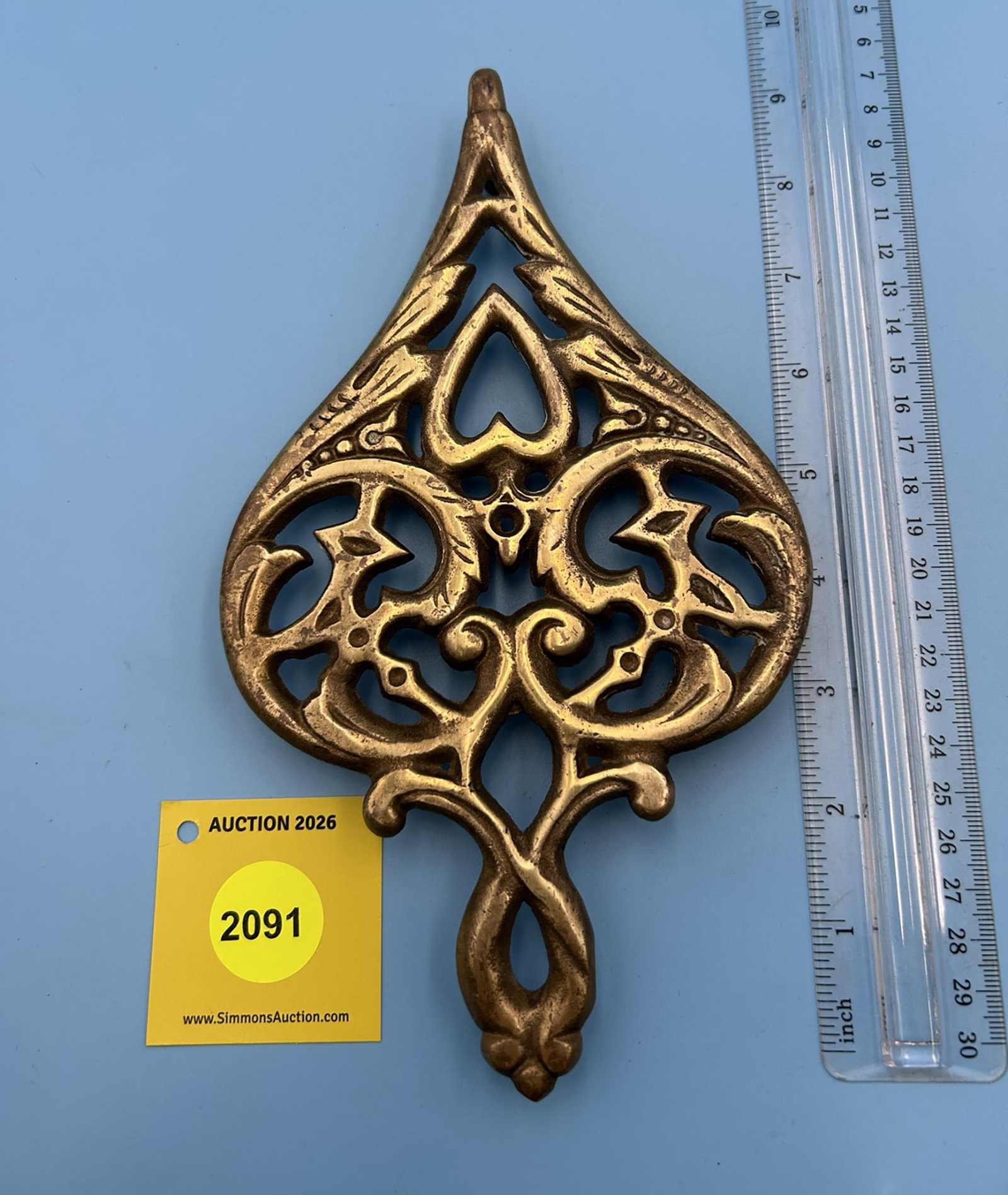 Brass Wilton Bellows 9'' x 5'' w/ three feet trivet. On reverse marked with Wilton (1 of 2)