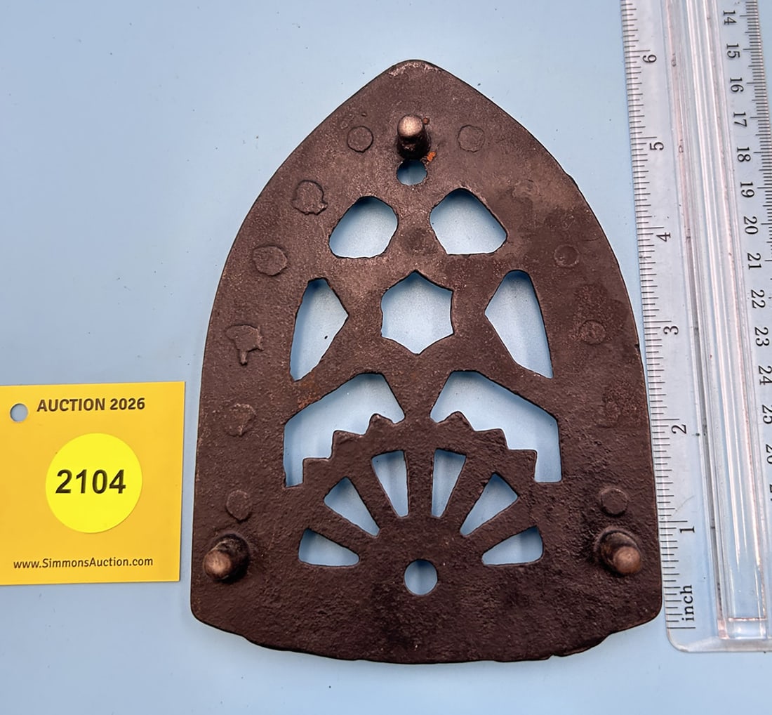 Unsigned Cleveland Star & Sunburst 6'' x 4 1/2'' w/ three feet trivet. With scalloped iron guide ... - 2
