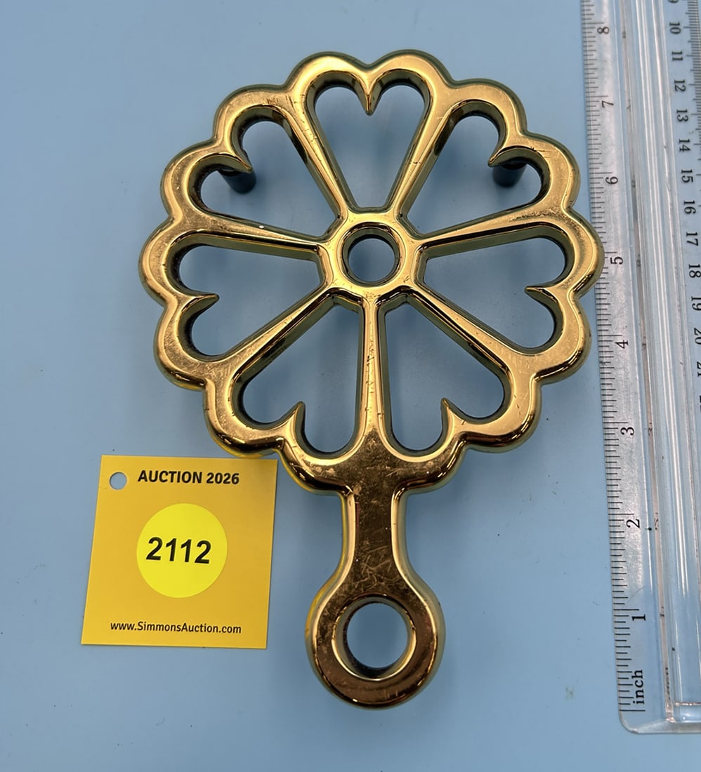Baldwin Shelburne Museum seven hearts 6 5/8'' x 4 5/8'' w/ three feet trivet. On reverse marked w... (1 of 2)