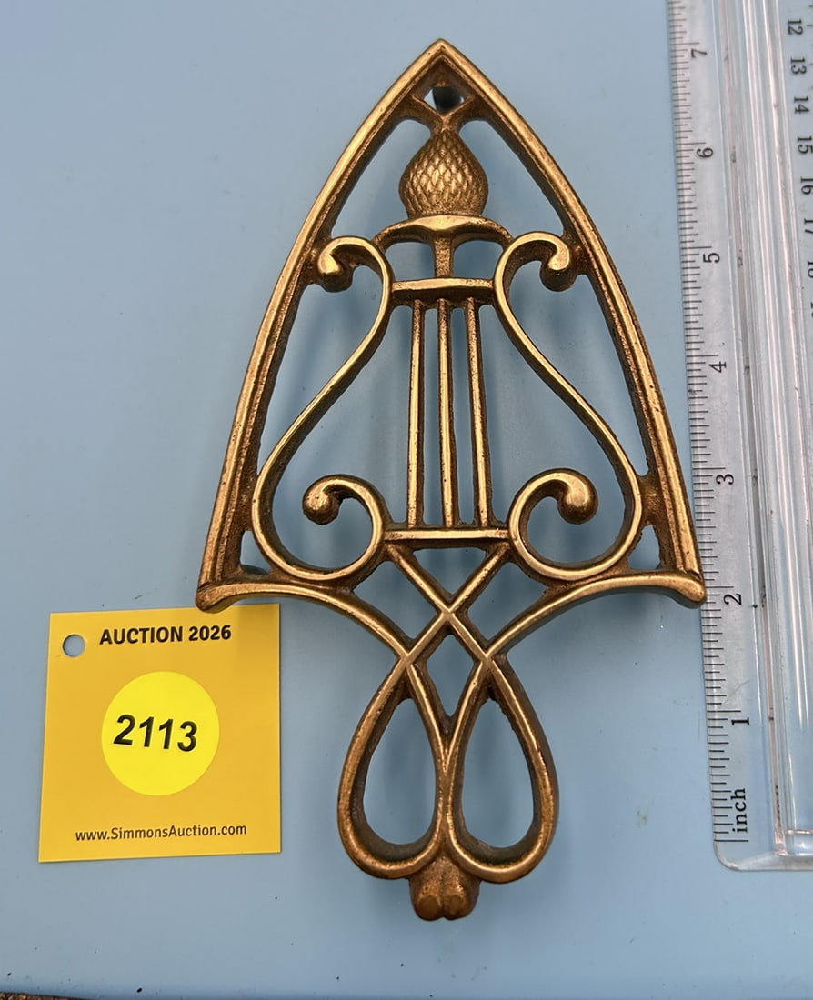 Brass Unsigned Pineapple & Bars 7'' x 3 7/8'' w/ three feet trivet. On reverse marked with number... (1 of 2)