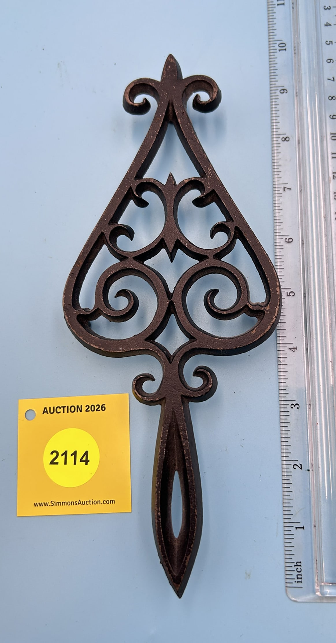Fleur-De-Lis Union Manufacturing Company/ JZH Tear Drop 9'' x 3 1/2'' w/ three feet trivet. On re... (1 of 2)