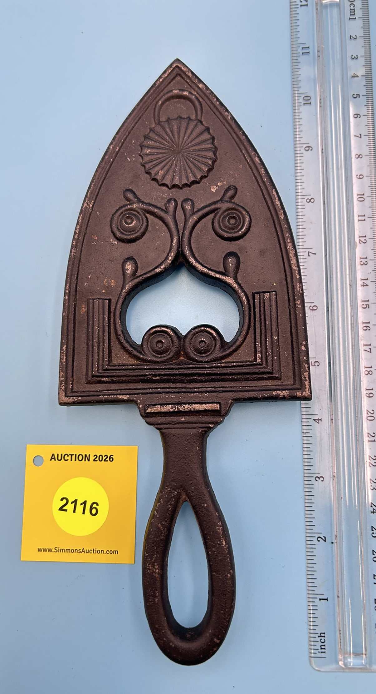 Old Sturbridge 10 1/2'' x 4 1/4'' w/ three feet trivet. On reverse marked with numbers 5-21. (1 of 2)