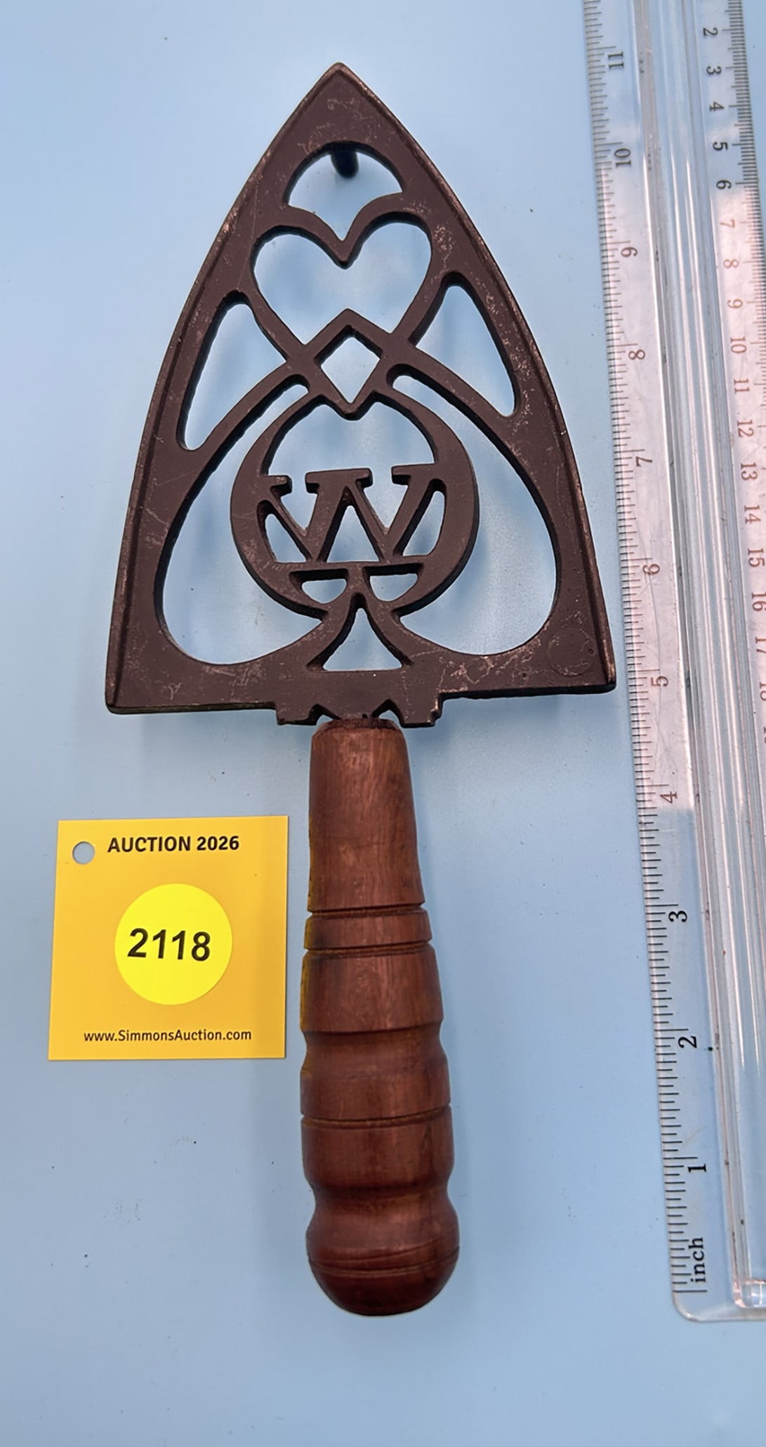 Heart with W, Plain 10'' x 4'' w/ three feet and wooden handle trivet. Very shallow side iron guide (1 of 2)