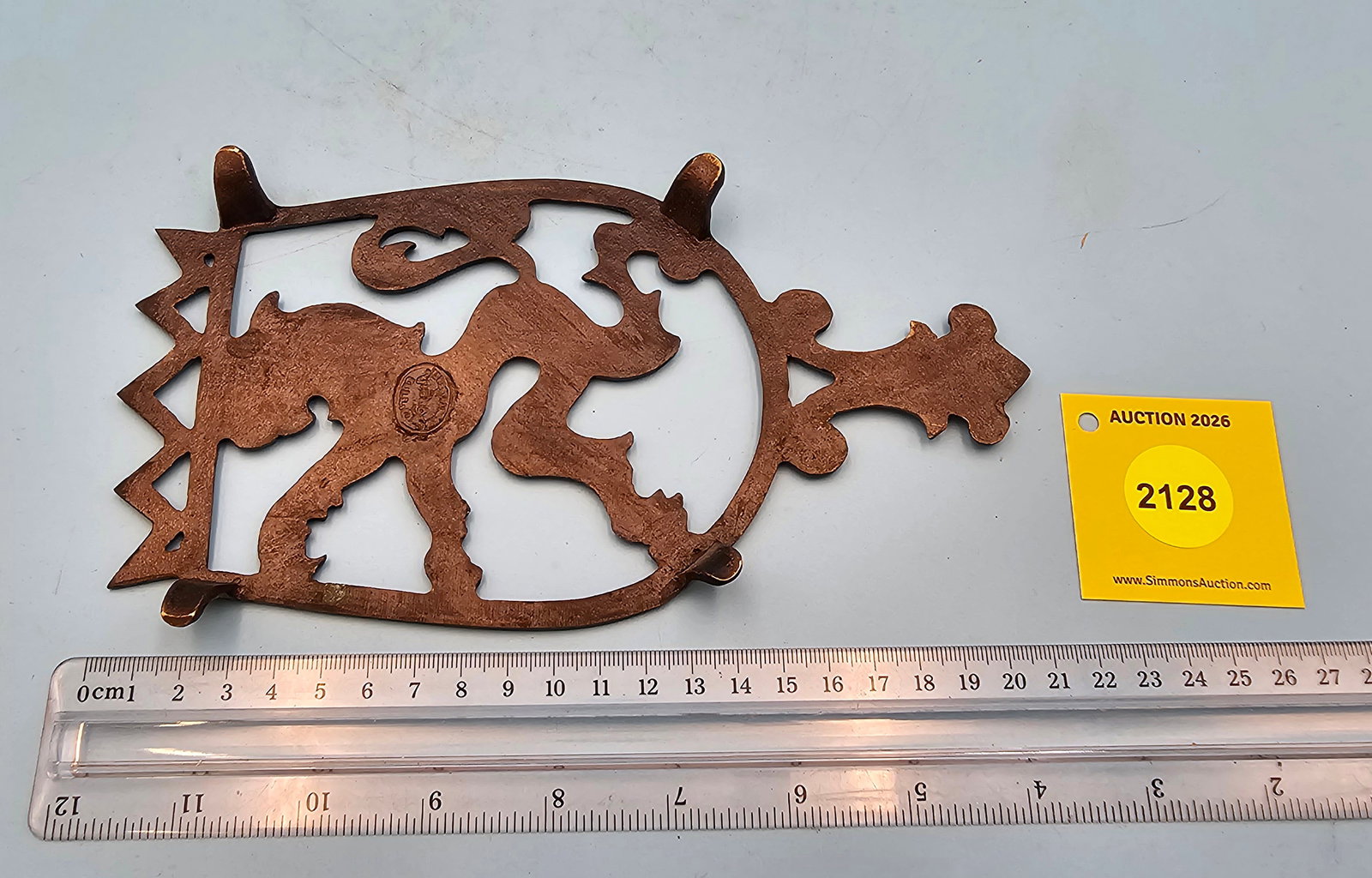 Nordia Dayagi Brass lion 8 1/2'' x 4 1/2'' w/ four feet trivet. On reverse marked with Nordia logo - 2