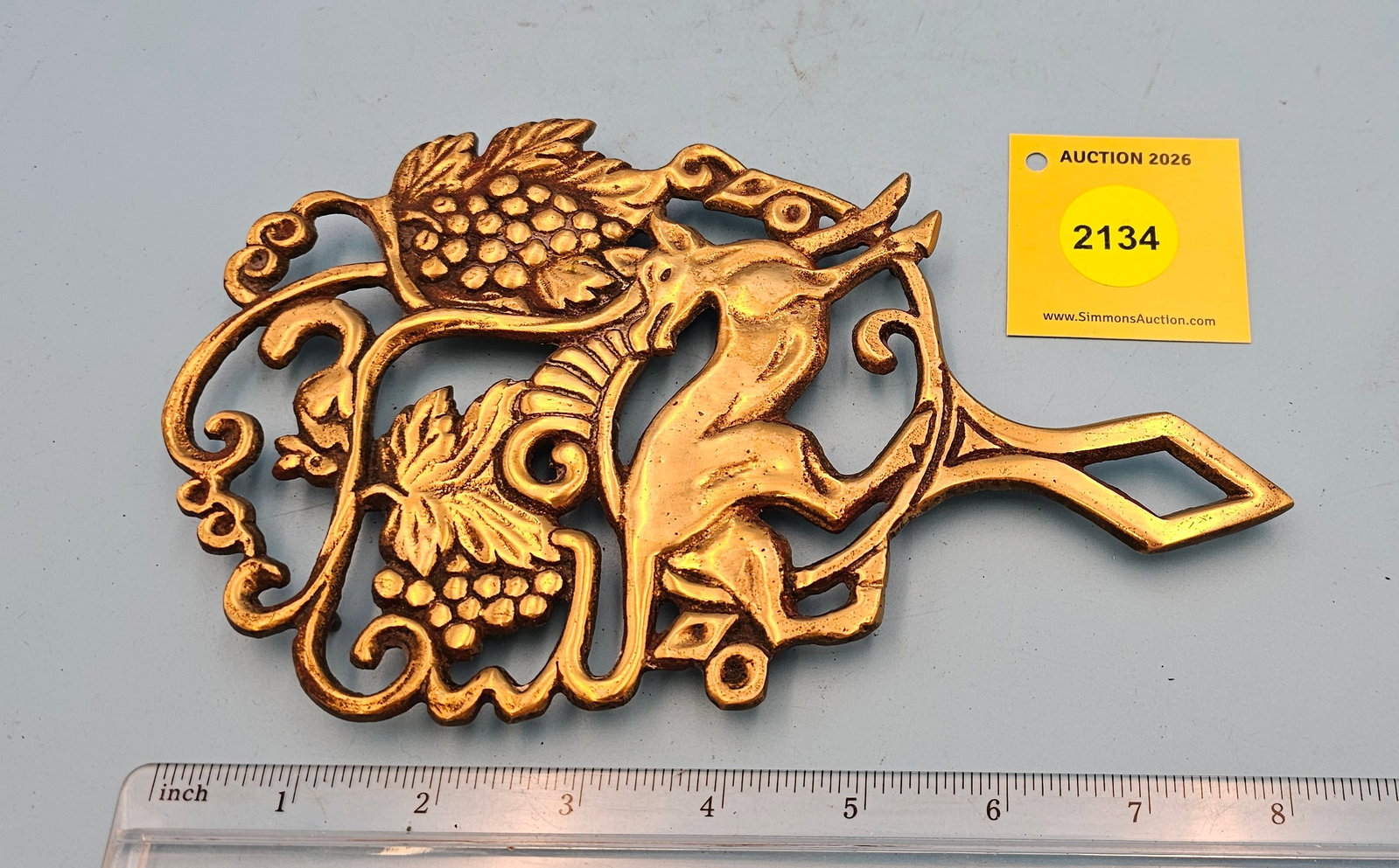 Unmarked Brass Deer & Grapes 8 1/2'' x 5'' w/ four feet trivet. (1 of 2)