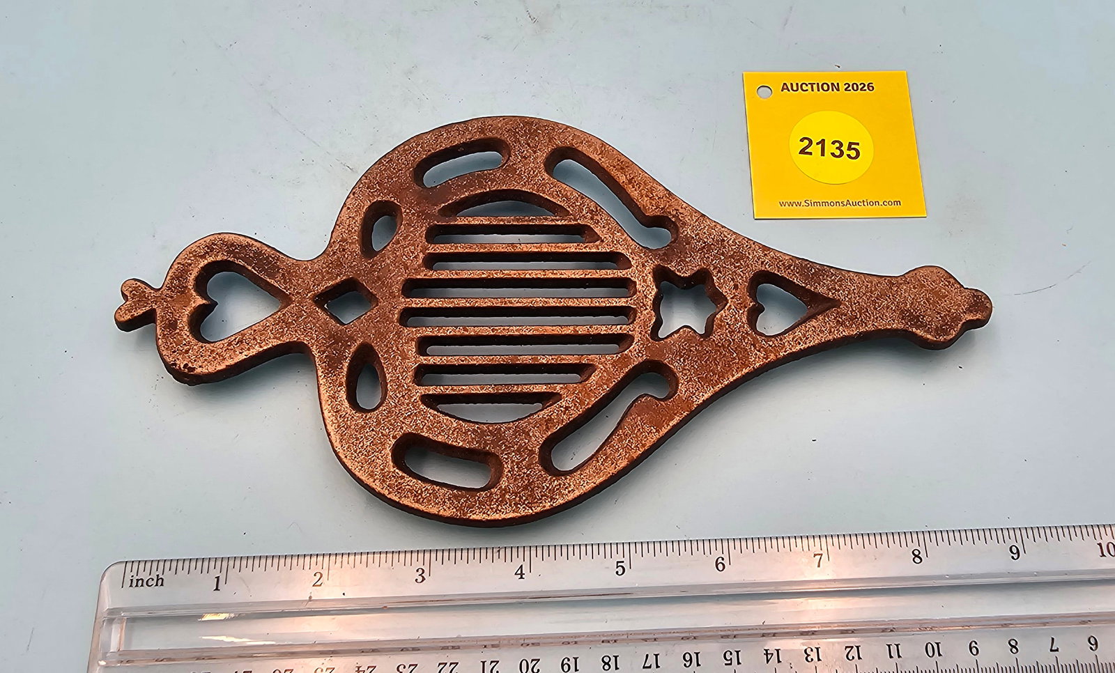 EMIG T 50 Dutch Style 9 1/2'' x 4 1/2'' w/ three feet trivet. On reverse marked with "EMIG T 50": EMIG T 50 Dutch Style 9 1/2'' x 4 1/2'' w/ three feet trivet. On reverse marked with "EMIG T 50"