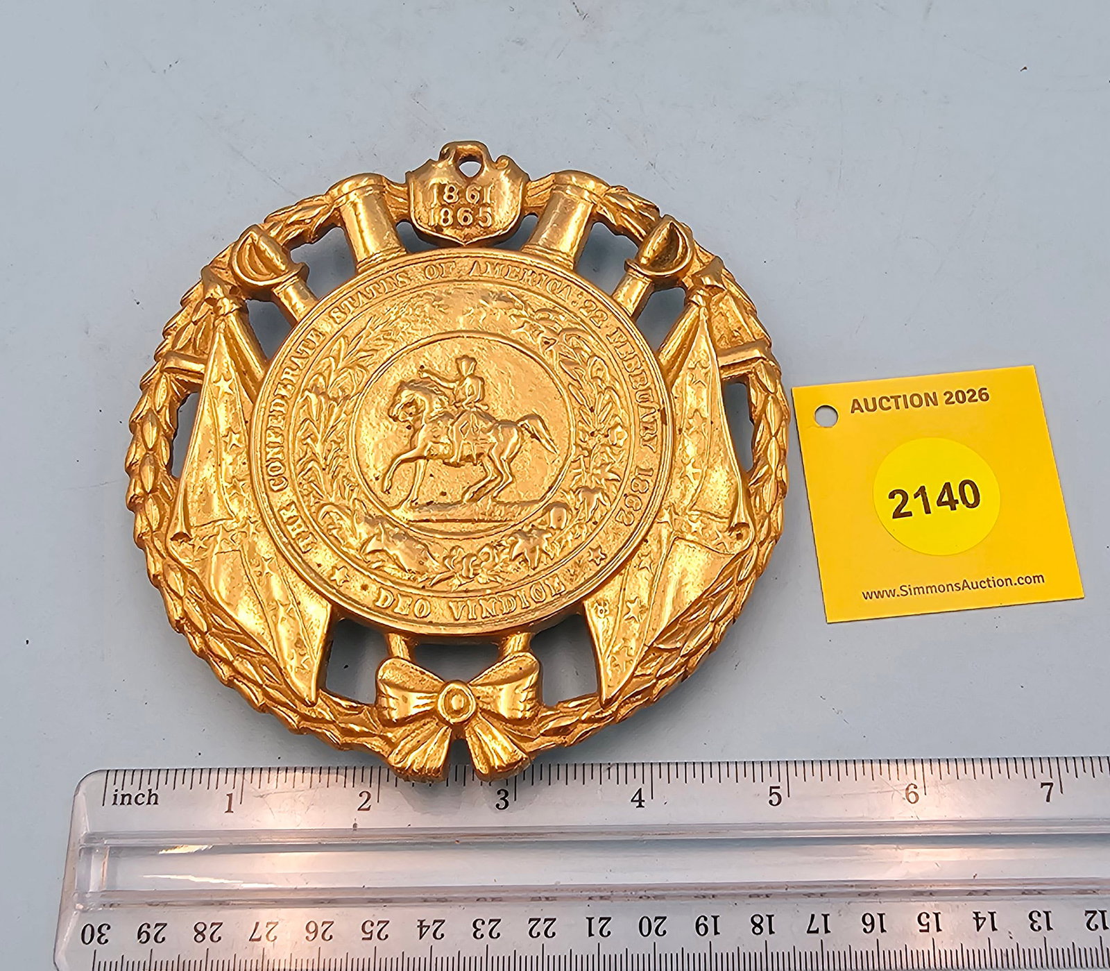 C.S.A 5 1/2'' diameter w/ three feet trivet. On the face marked with "The Confederate States of A... (1 of 2)