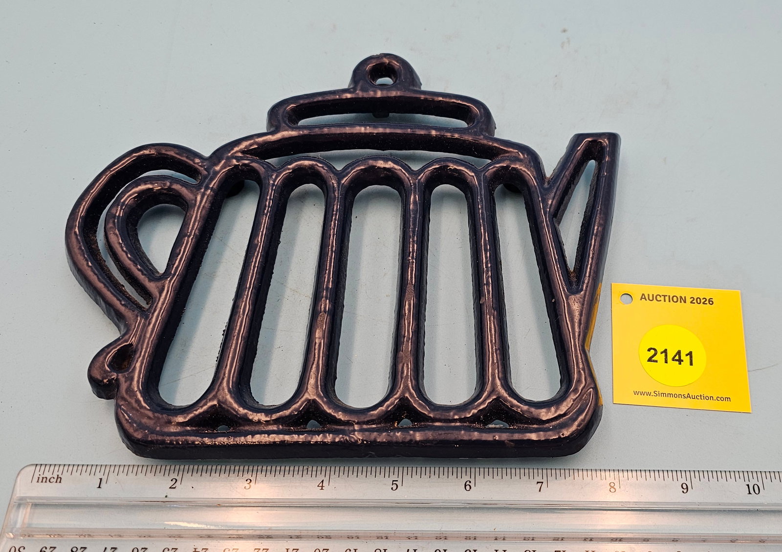 Blue Iron shaped trivet 8.5 x 7 x 3/4": Blue Iron shaped trivet 8.5 x 7 x 3/4"