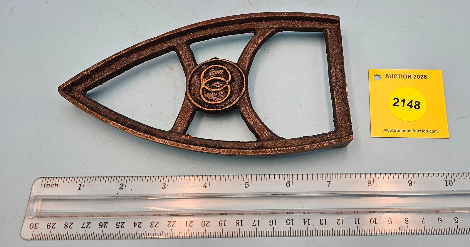 Cast iron trivet w/interlocking circles 7 1/4 x 4 x 3/4" (1 of 2)