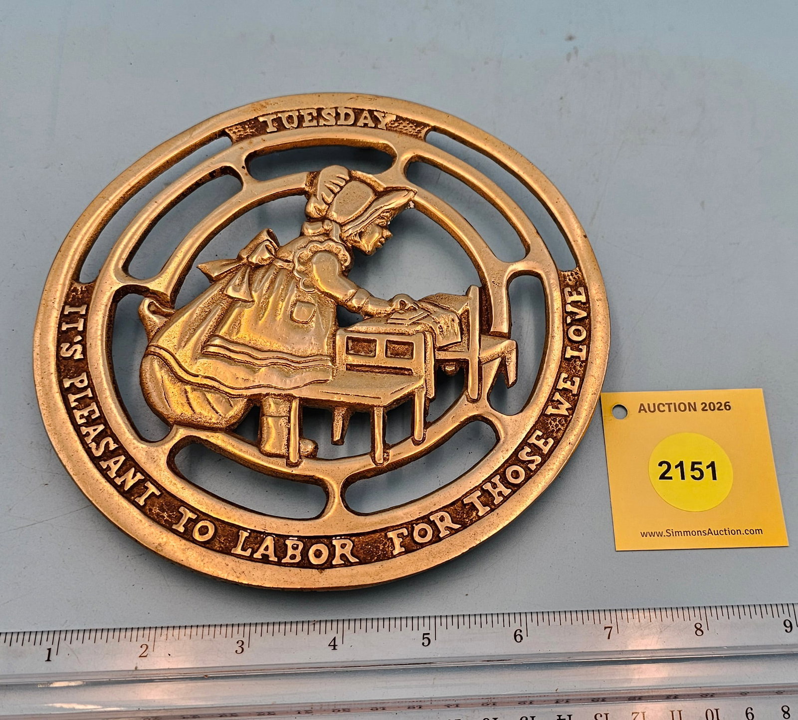 Round brass trivet, "Tuesday", "It's Pleasant To Labor For Those We Love" diameter 6 3/4" height ...: Round brass trivet, "Tuesday", "It's Pleasant To Labor For Those We Love" diameter 6 3/4" height 5/8"