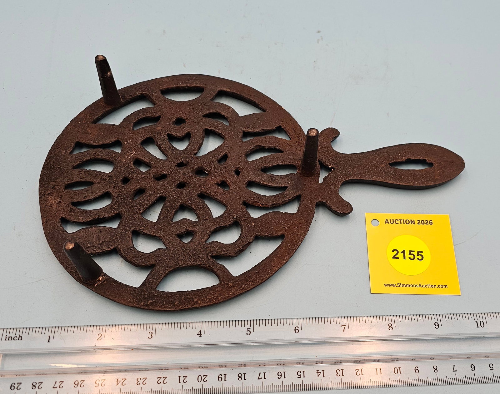 Round cast iron trivet w/handle 10 x 6 1/4 x 1 1/4" - 2