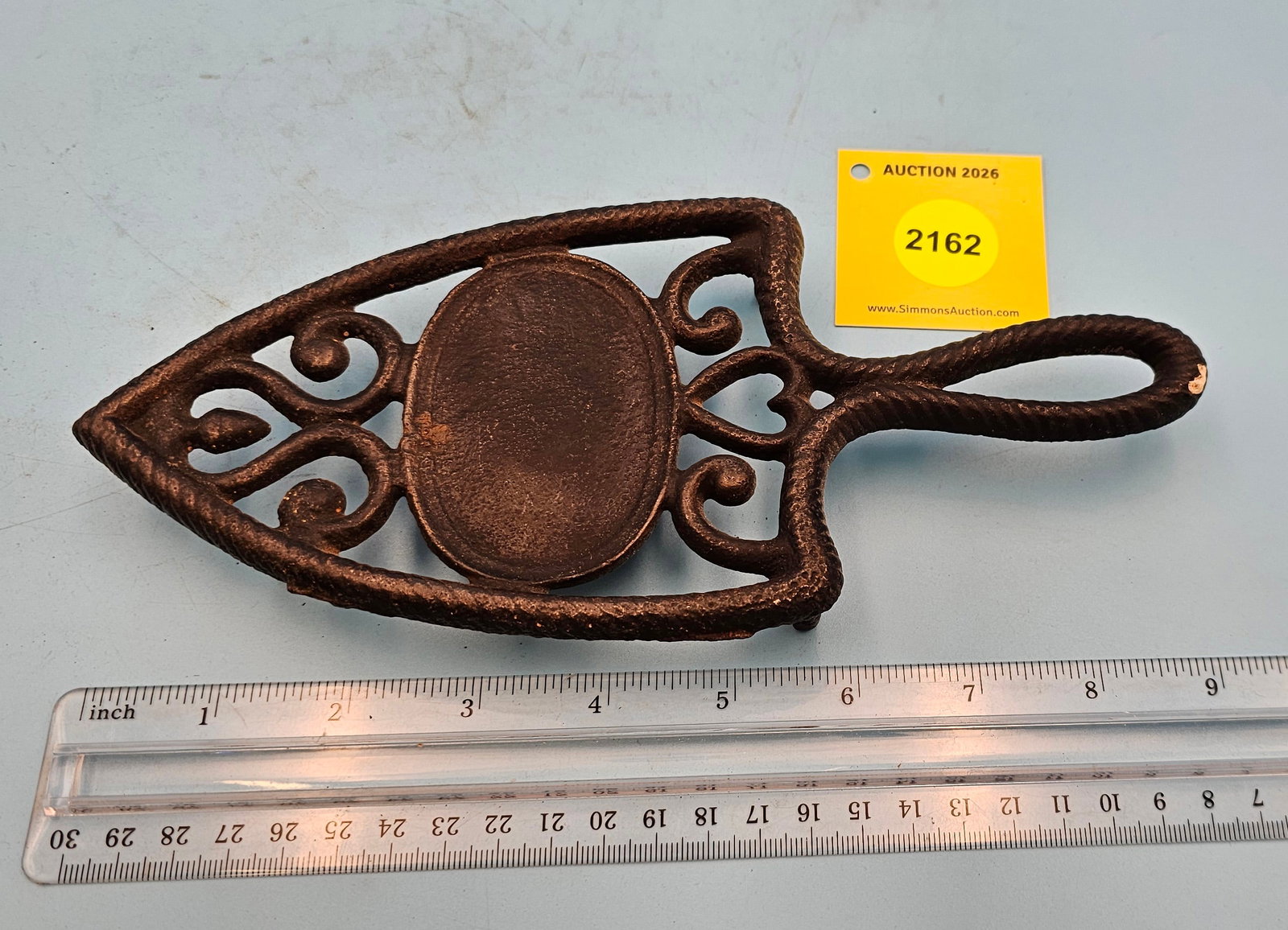 Spade cast iron trivet, 9 1/8 x 4 x 1 1/8" (1 of 2)