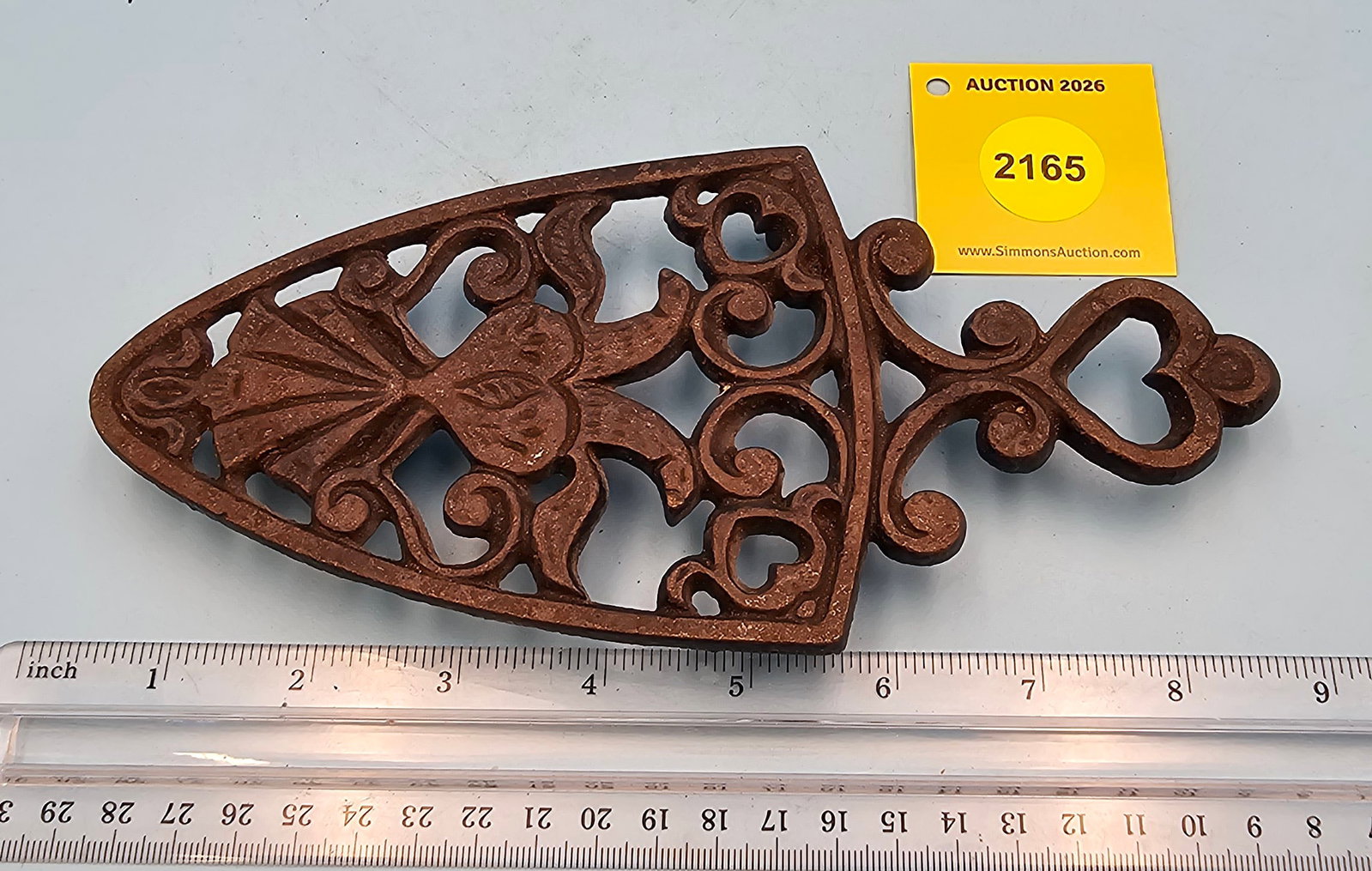Spade cast iron trivet, 8 3/8 x 3 7/8 x 3/4" (1 of 2)