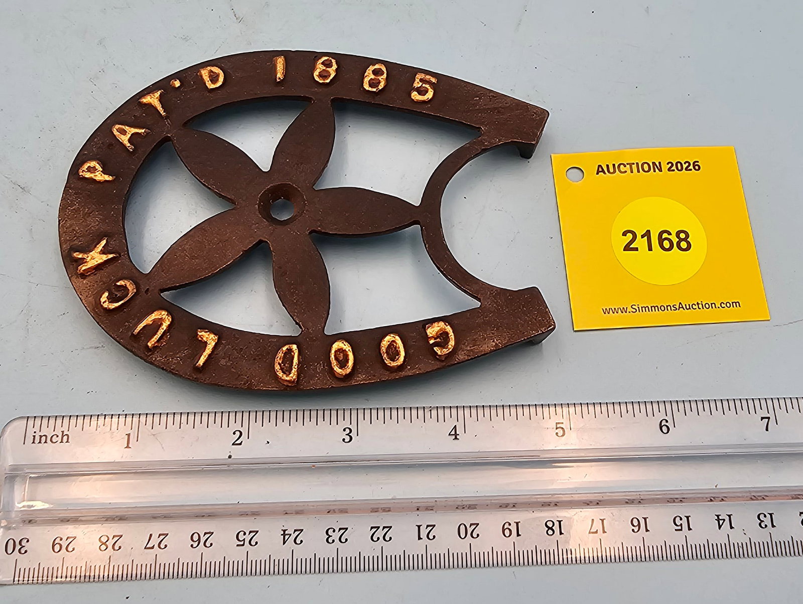 Horseshoe trivet, Good Luck Pat'd 1885, 5 x 3 3/4 x 1/2": Horseshoe trivet, Good Luck Pat'd 1885, 5 x 3 3/4 x 1/2"