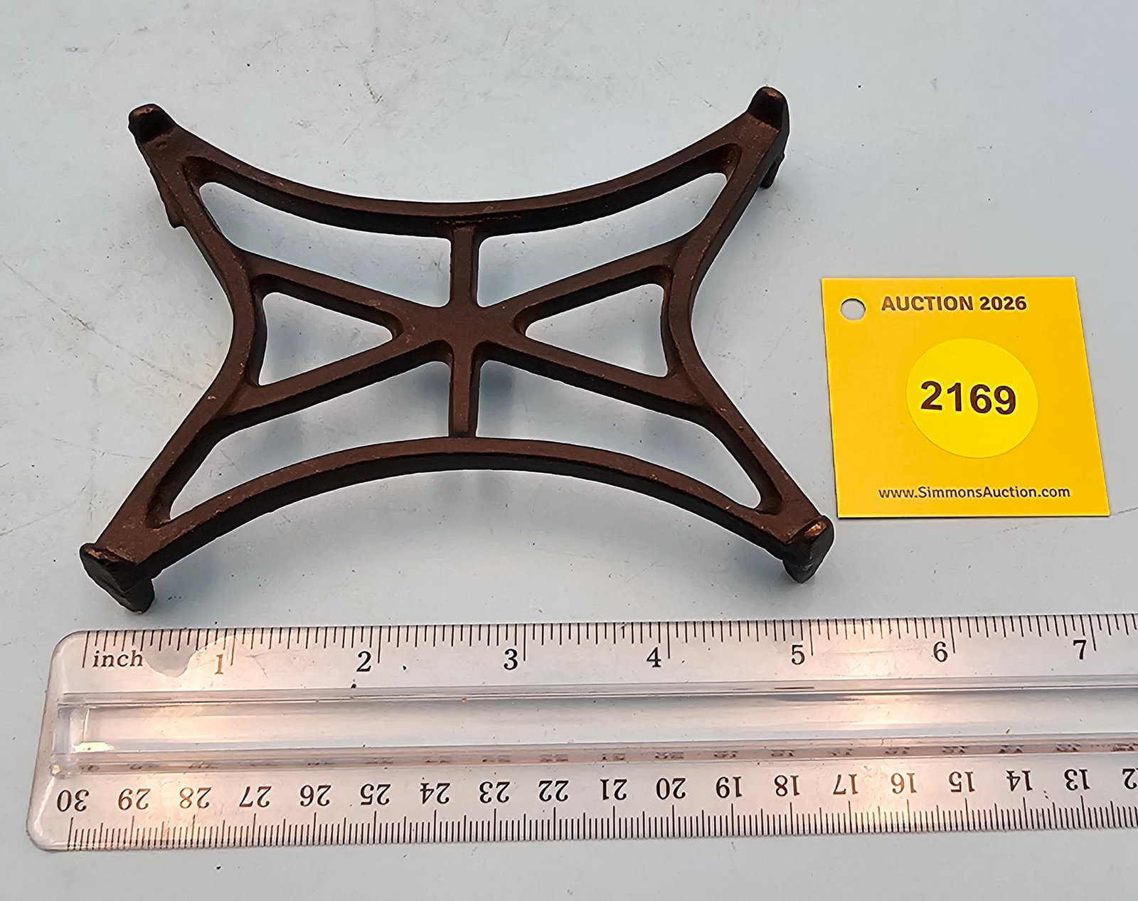 Iron trivet, 5 x 3 5/8 x 1": Iron trivet, 5 x 3 5/8 x 1"