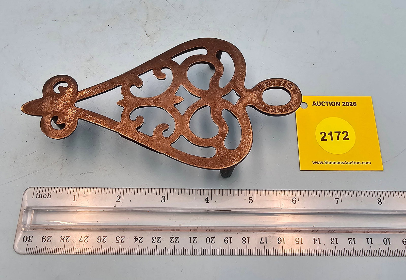 Spade trivet, flat top design, marked "British Make" on handle, 6 1/4 x 3 3/8 x 1" (1 of 2)