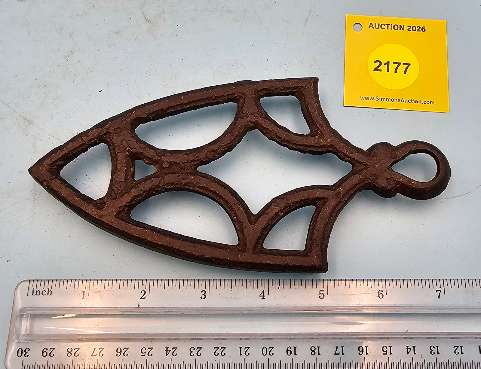 Iron trivet, geometric design, 7 1/4 x 3 1/2 x 5/8" (1 of 2)