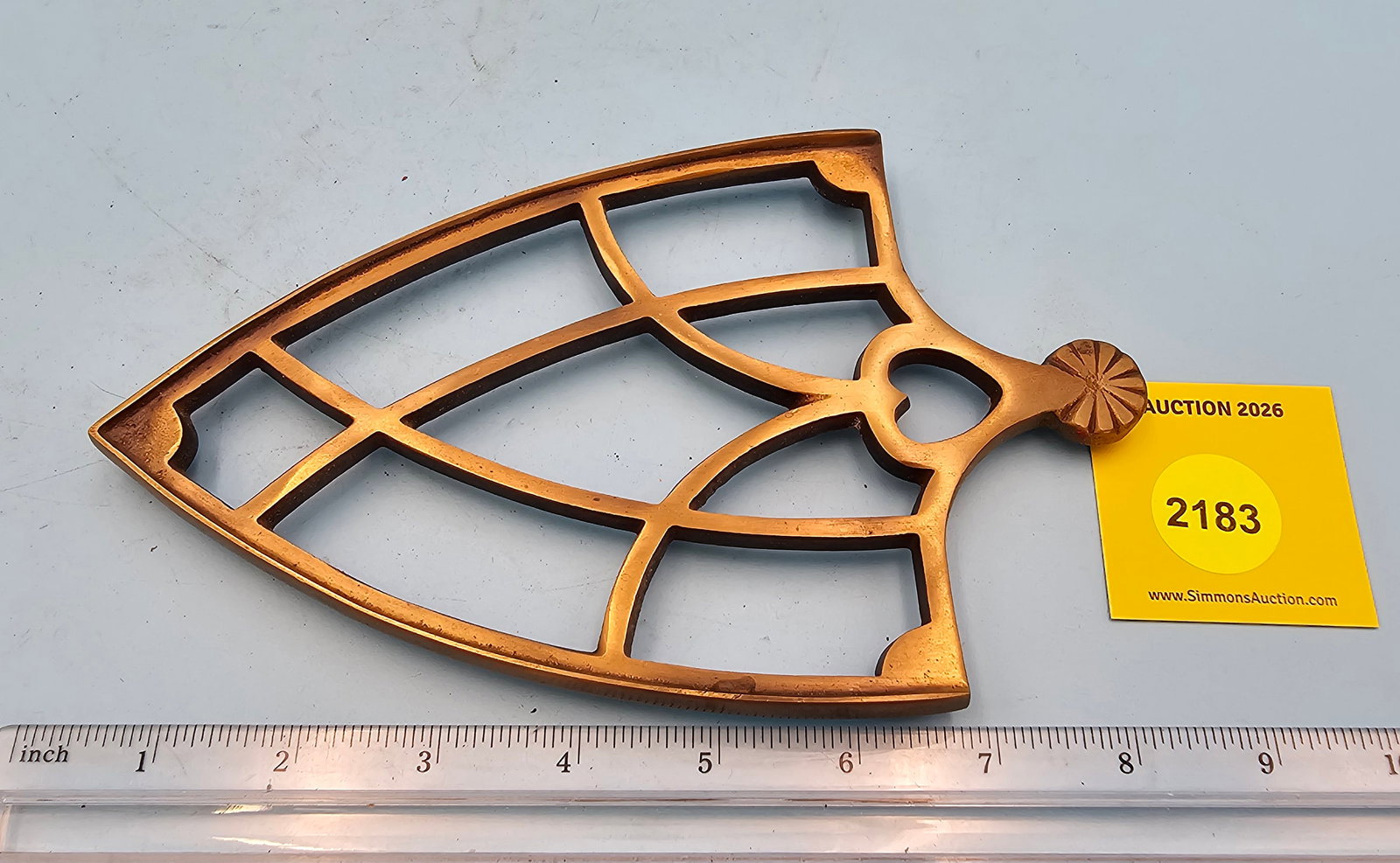 Brass spade trivet, 8 1/8 x 4 7/8 x 5/8: Brass spade trivet, 8 1/8 x 4 7/8 x 5/8