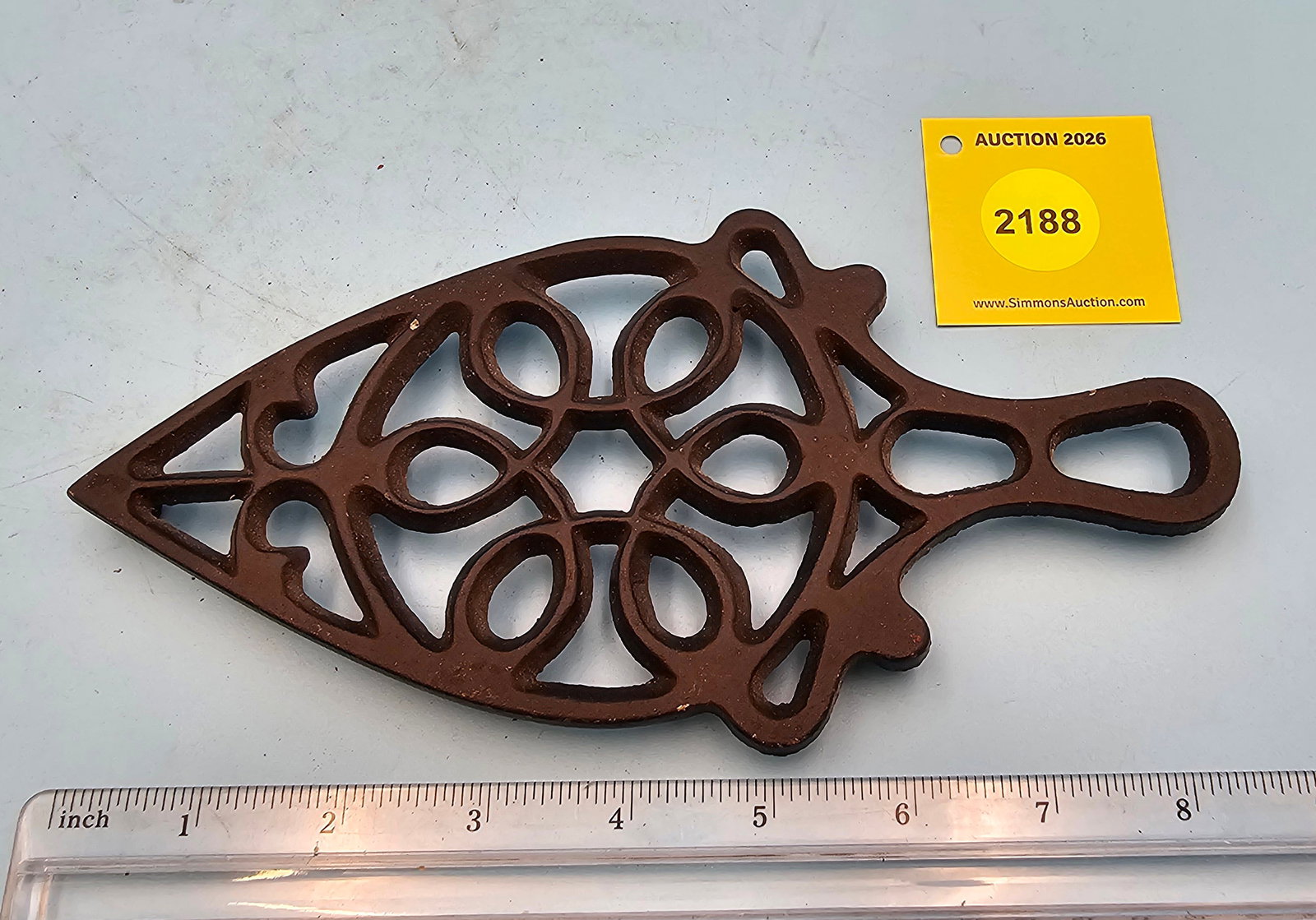 Spade trivet, geometric design, marked "EMIG T53" on back, 8 5/8 x 4 1/4 x 9/16" (1 of 2)