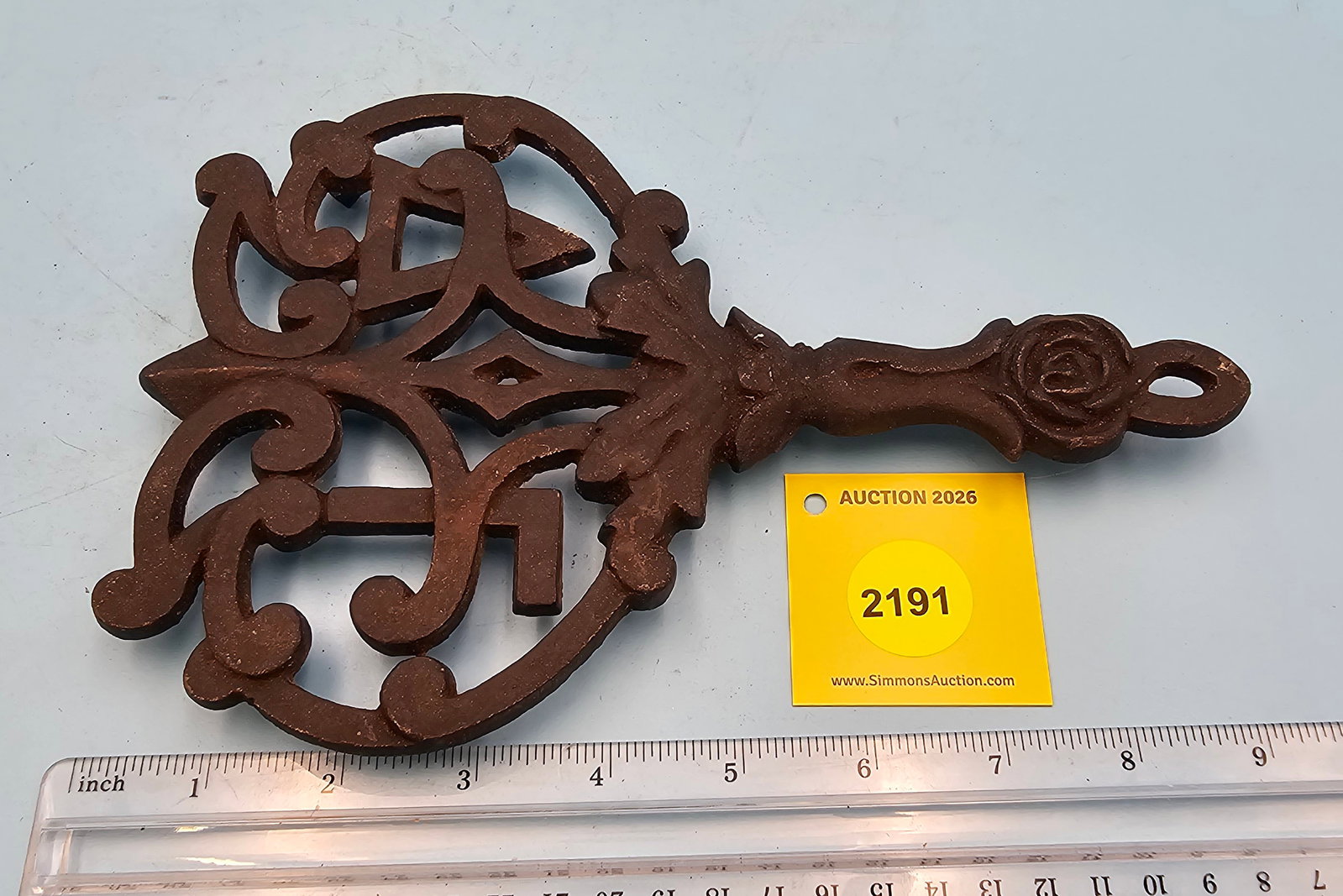 Cast iron trivet, 9 x 6 x 3/4" (1 of 2)