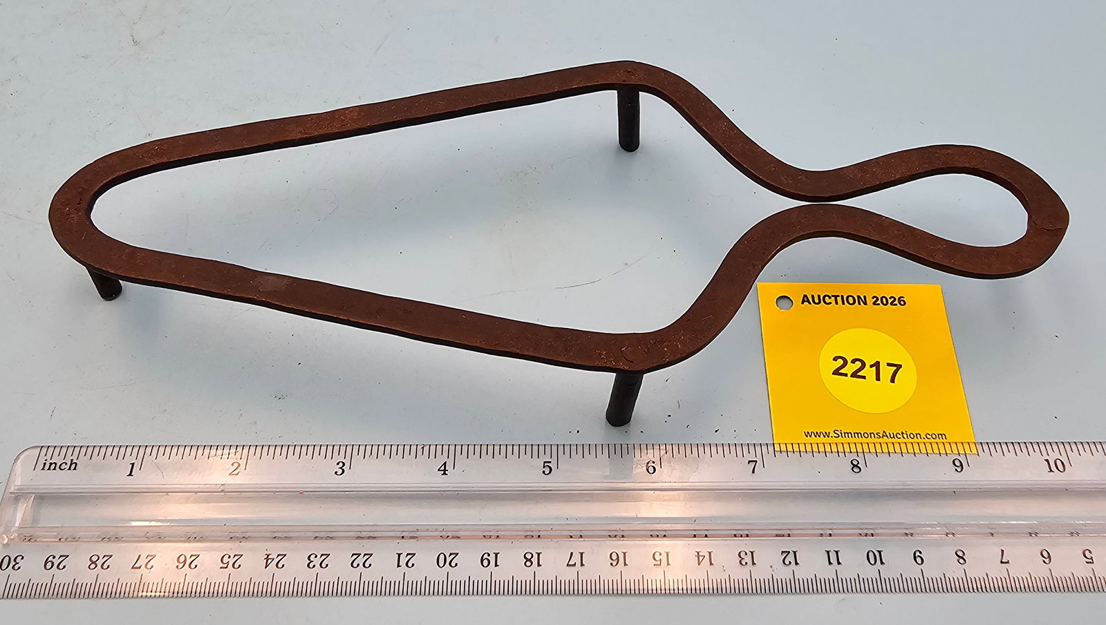 Iron trivet, 10 1/4 x 4 x 1 1/4" (1 of 2)
