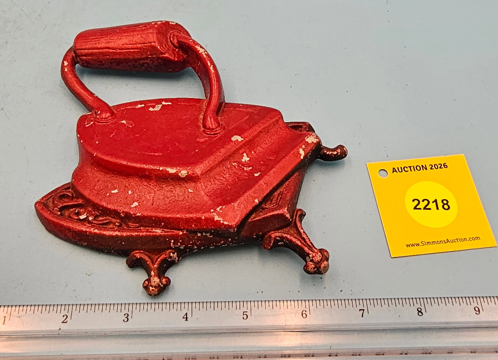 Metal wall iron décor, painted red (1 of 2)