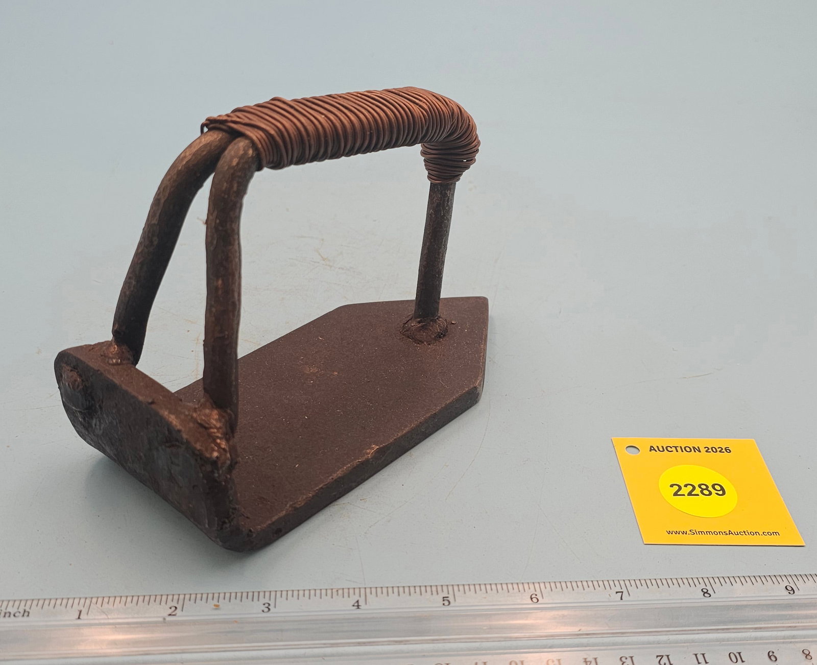 Flat iron, cast w/wire wrapped handle, L 6 3/4" - 3