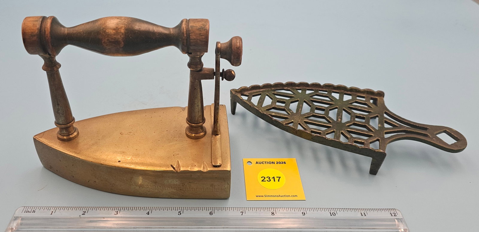 Brass slug iron, back lift gate, no slug w/green trivet L 6 3/4": Brass slug iron, back lift gate, no slug w/green trivet L 6 3/4"